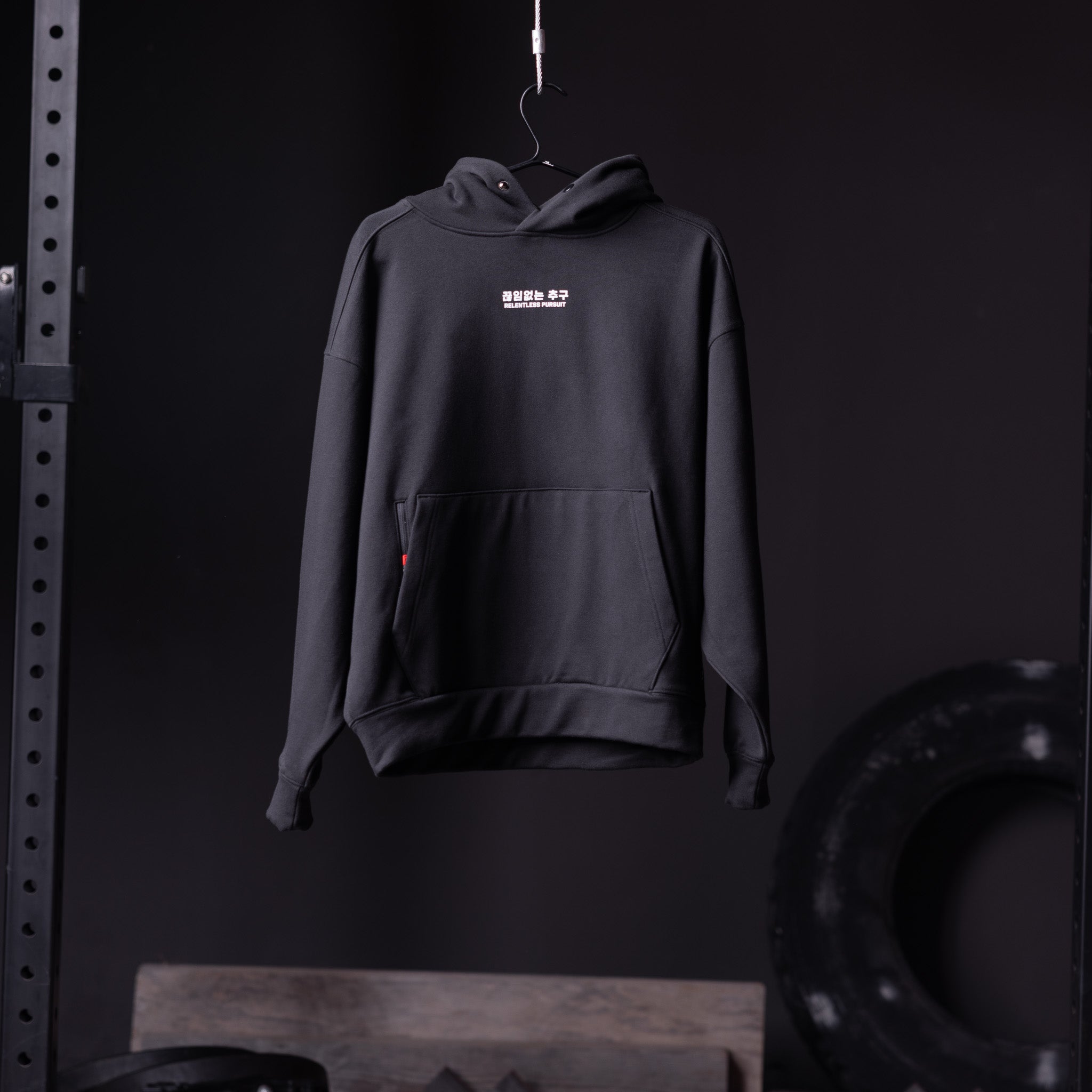 Flatlay Tech-Terry Zip Pocket Hoodie in black, front view