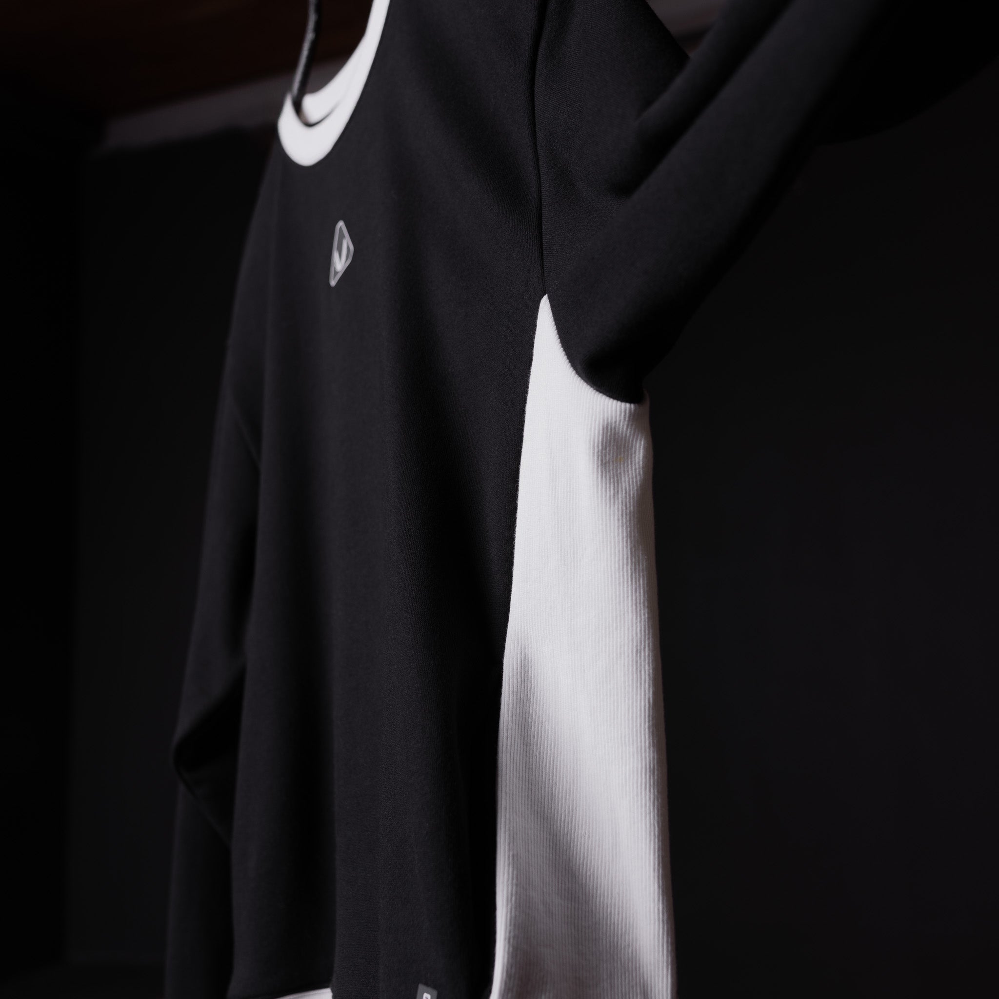 Terry crew neck sweatshirt in black with white stripe detail, modeled on person