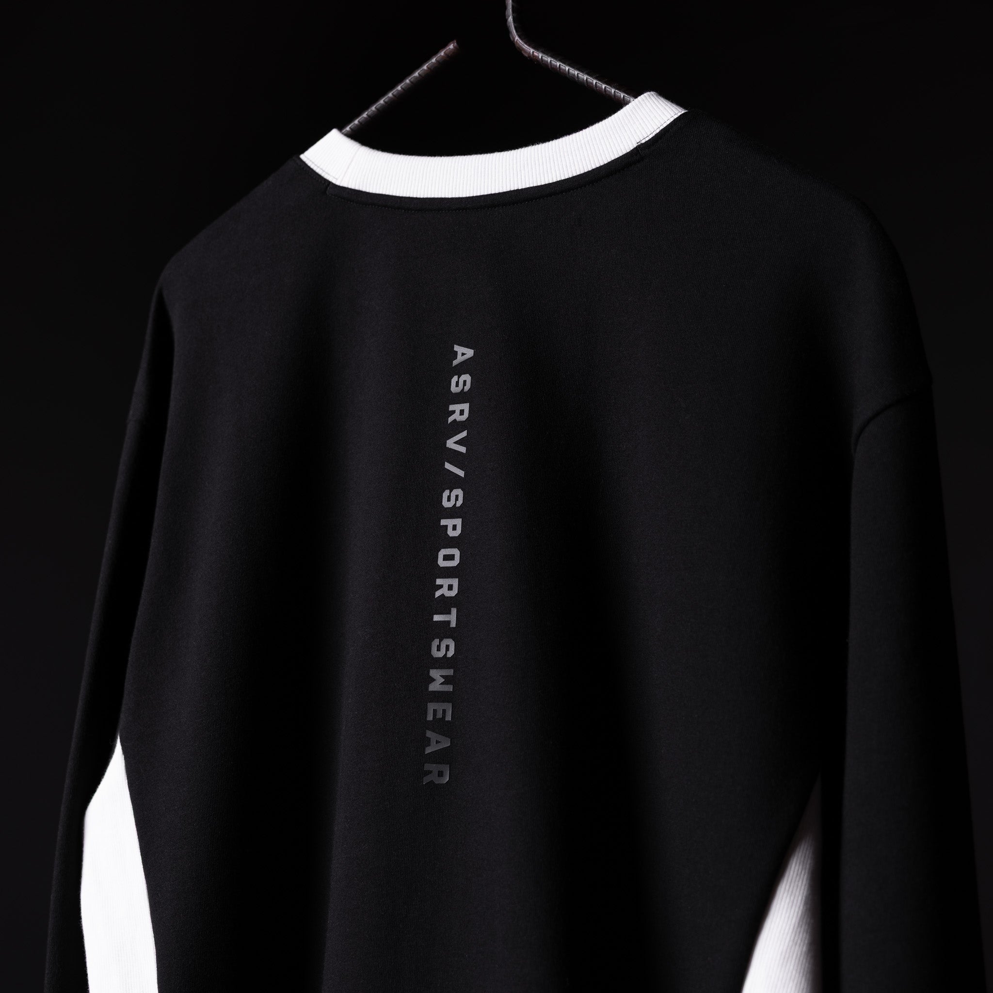 FA'24 Terry Crew Neck sweatshirt in black with white trim, displayed on model