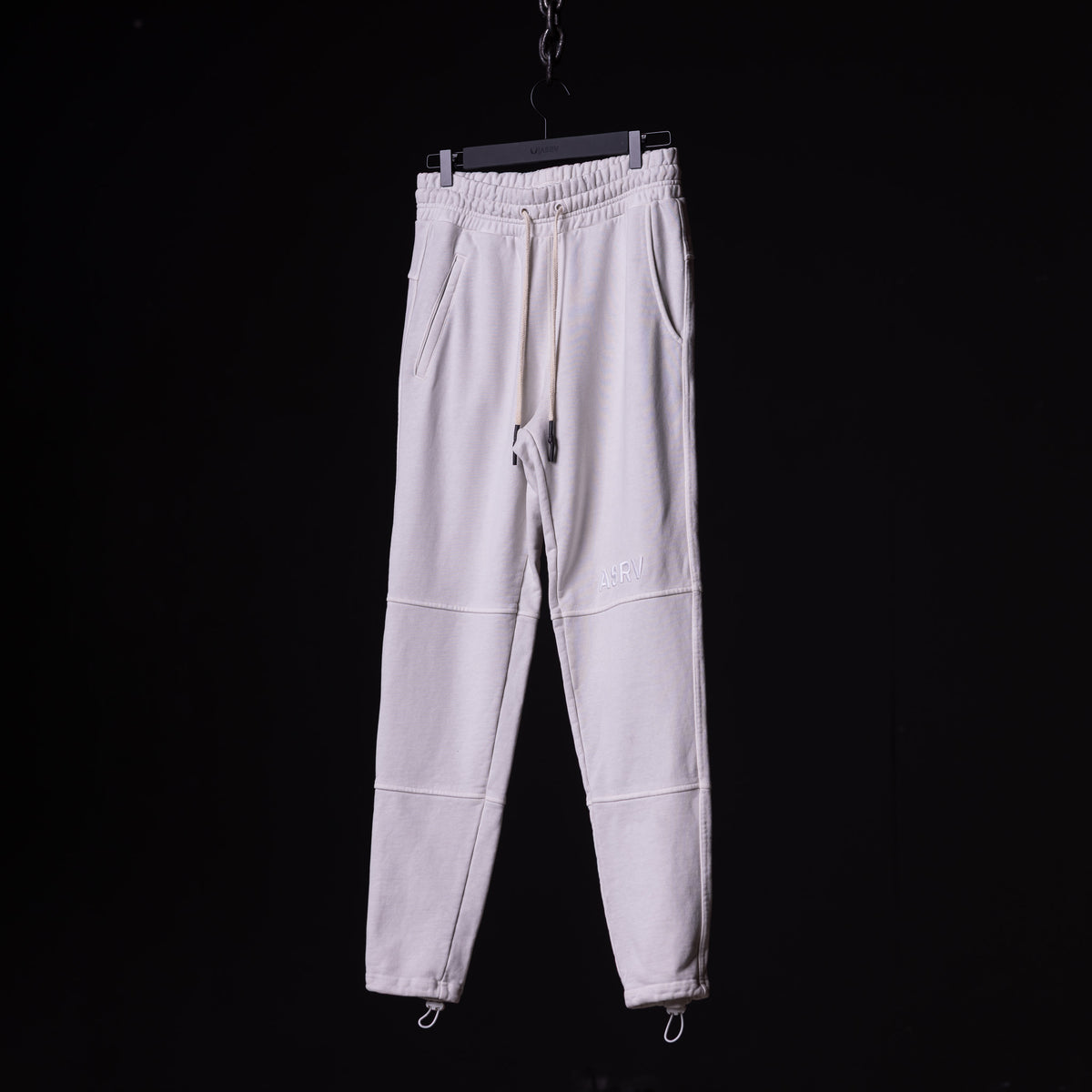 WN'20 Terry Relaxed Jogger in lavender, hanging on hanger against black background