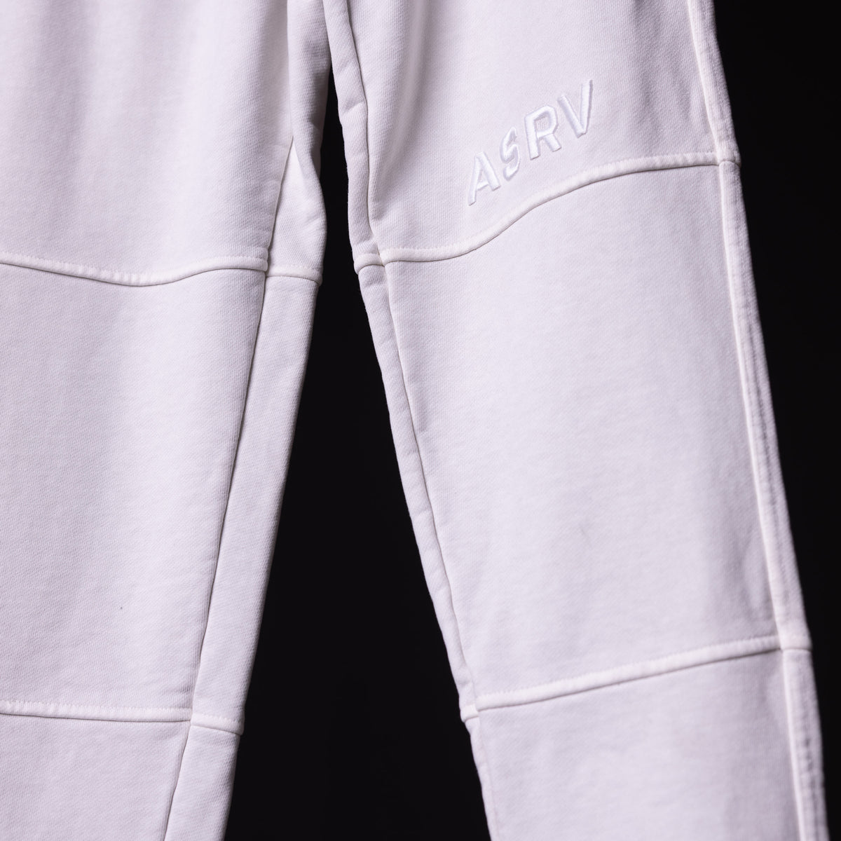 WN'20 Terry Relaxed Jogger in lavender, detail view of side seams and ASRV branding