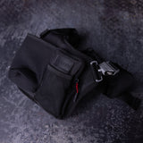 Flatlay of SM'23 Crossbody bag in black, angled view