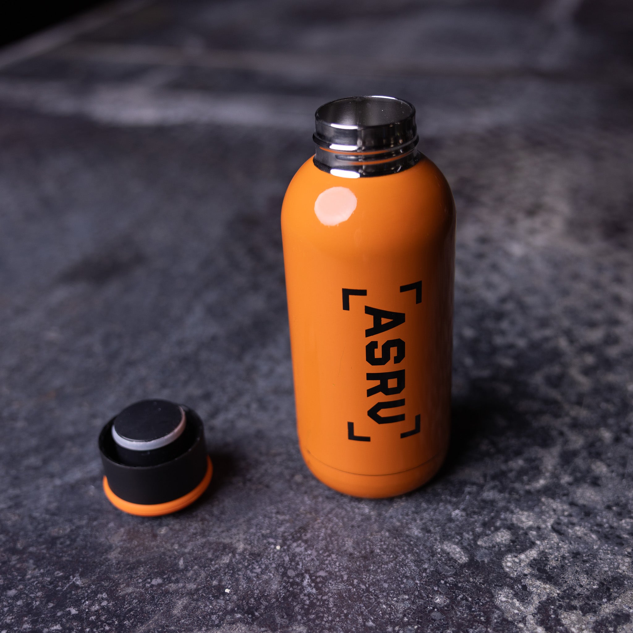 ASRV 2017 Training Division Water Bottle in orange, overhead view with cap removed