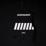 2018 Technical Vest in black with reflective stripes, displayed on hanger against dark background