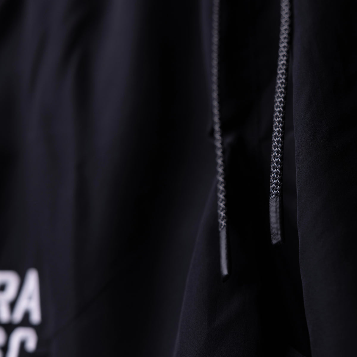 SP'22 Vintage 5" Training Short in black, detail shot of drawstring and fabric texture