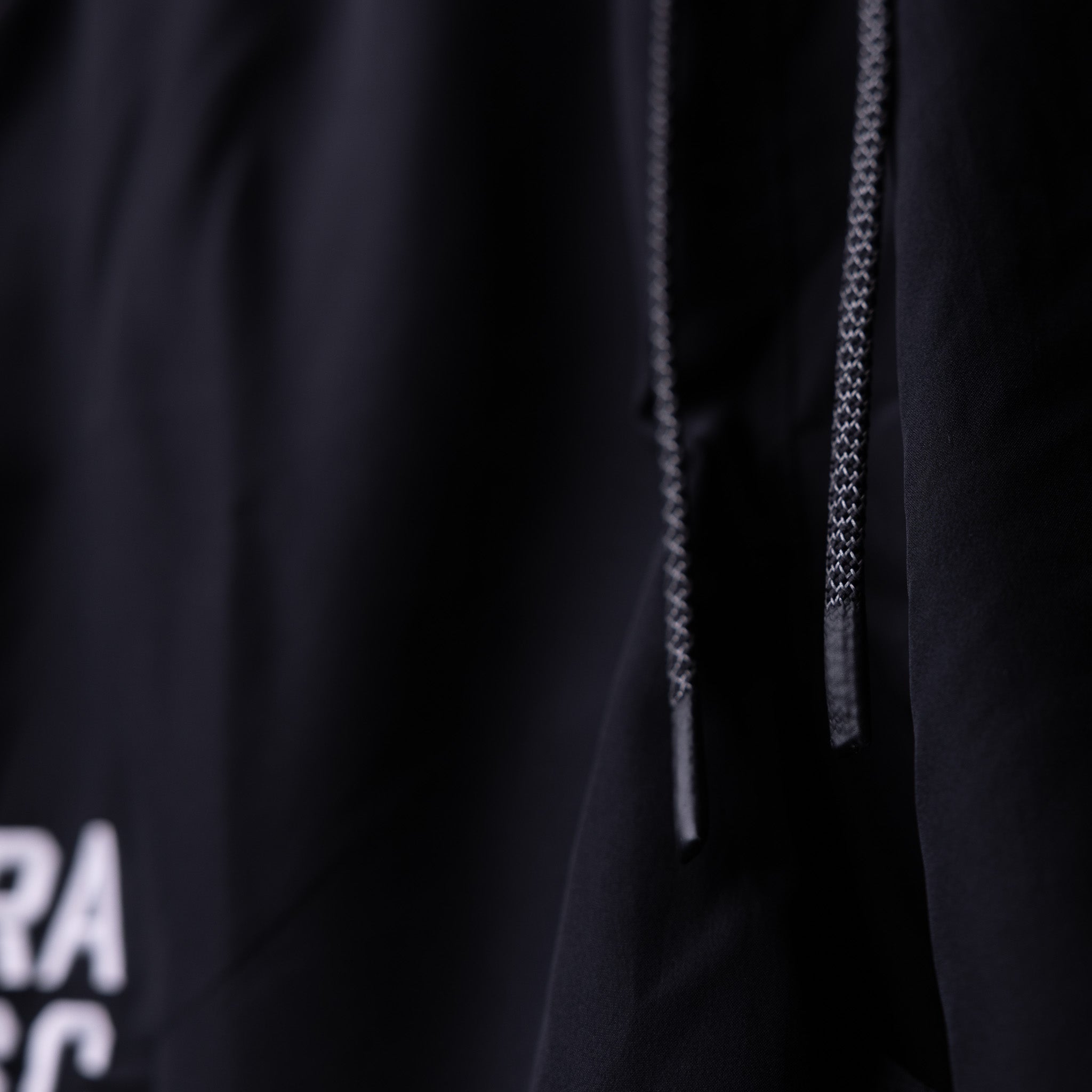 SP'22 Vintage 5" Training Short in black, detail shot of drawstring and fabric