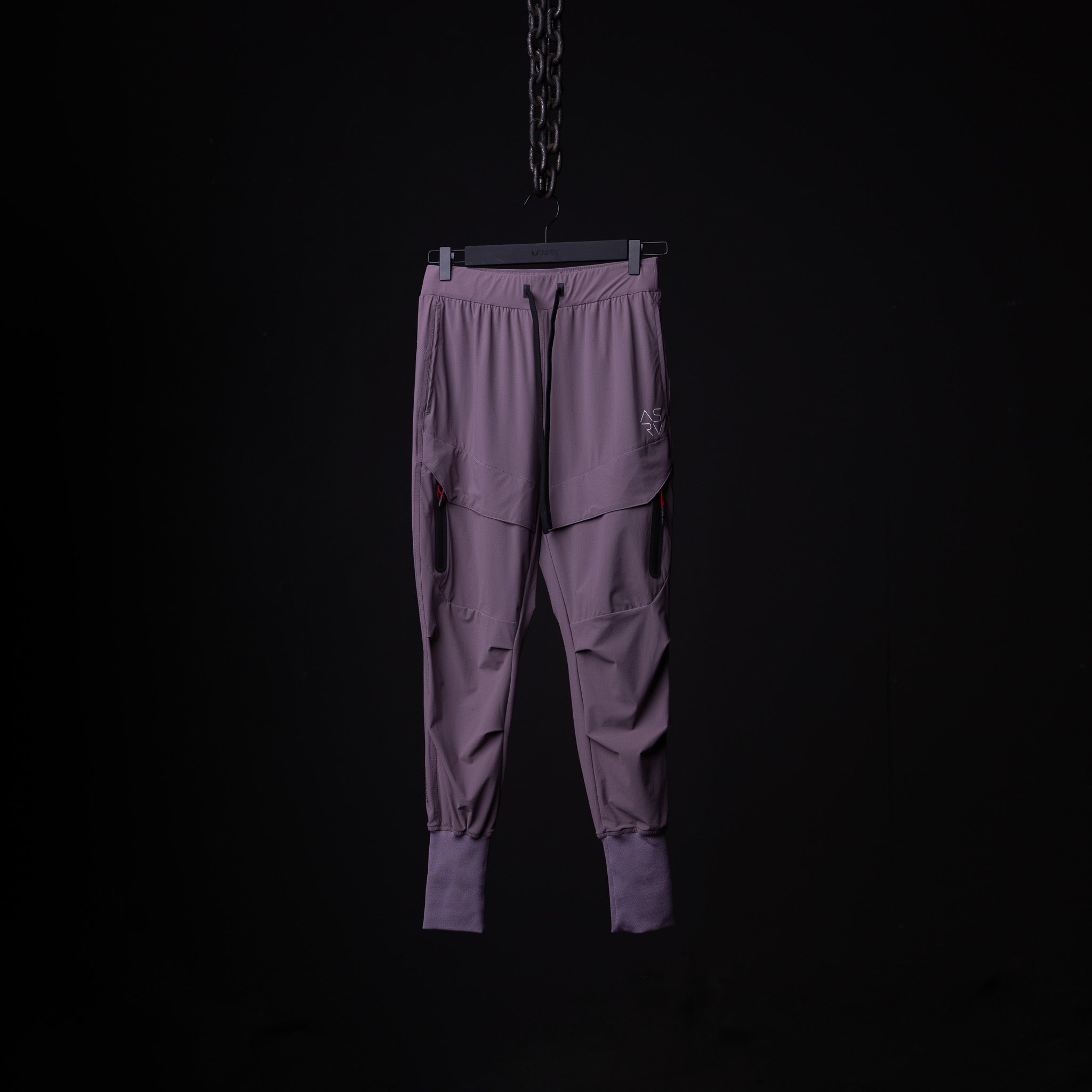 flatlay Cyber Tech High Rib Jogger in mauve purple, front view