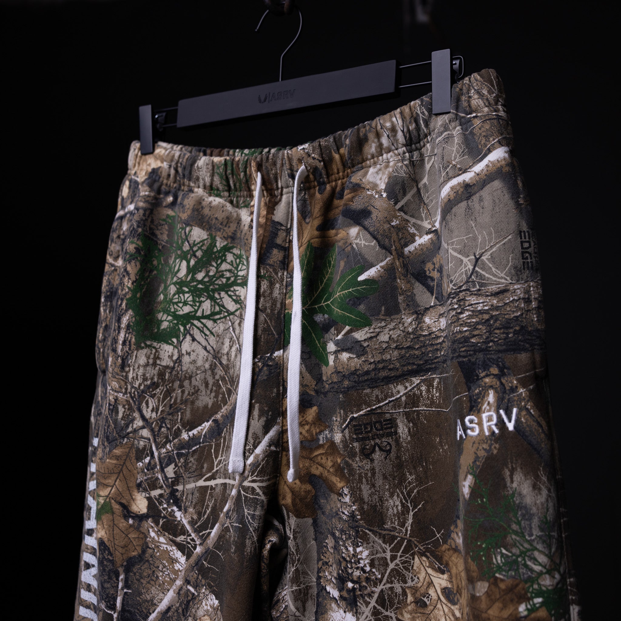 FA'23 Straight Leg Jogger in realtree camo print, front view on hanger