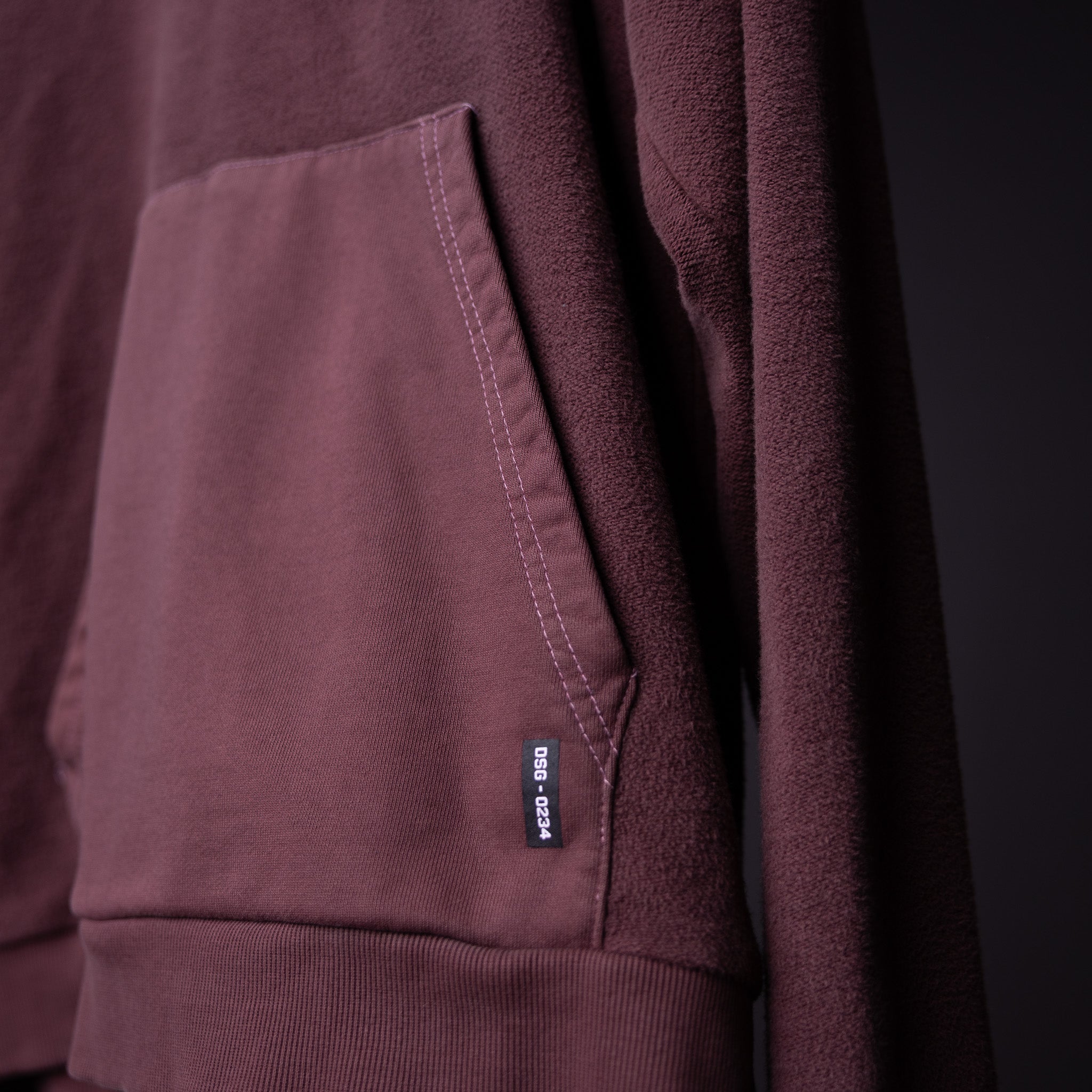 FA'19 Reverse Weave Hoodie in burgundy, closeup of pocket and fabric texture detail
