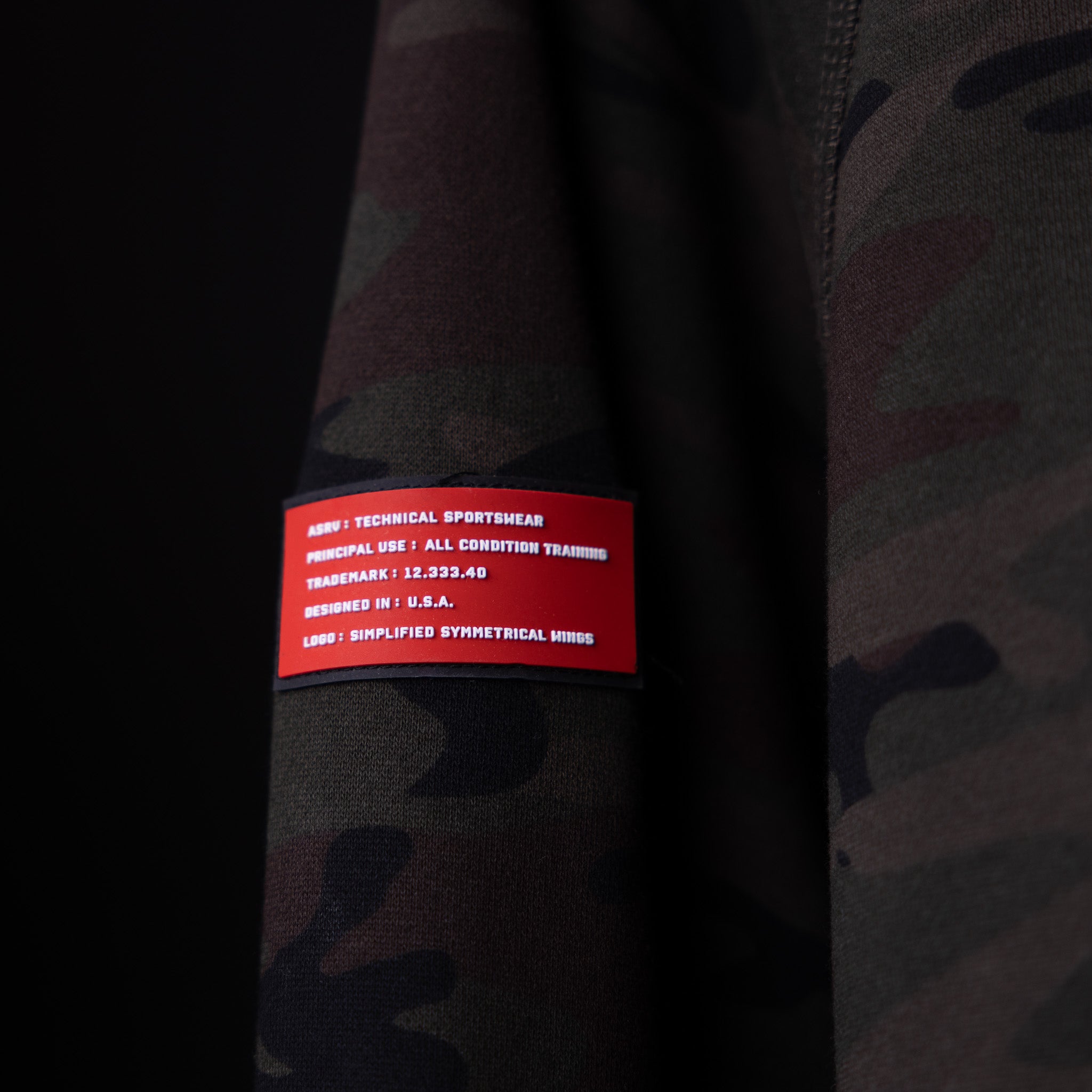 WN'19 RainPlus® Hoodie label closeup showing product details and branding