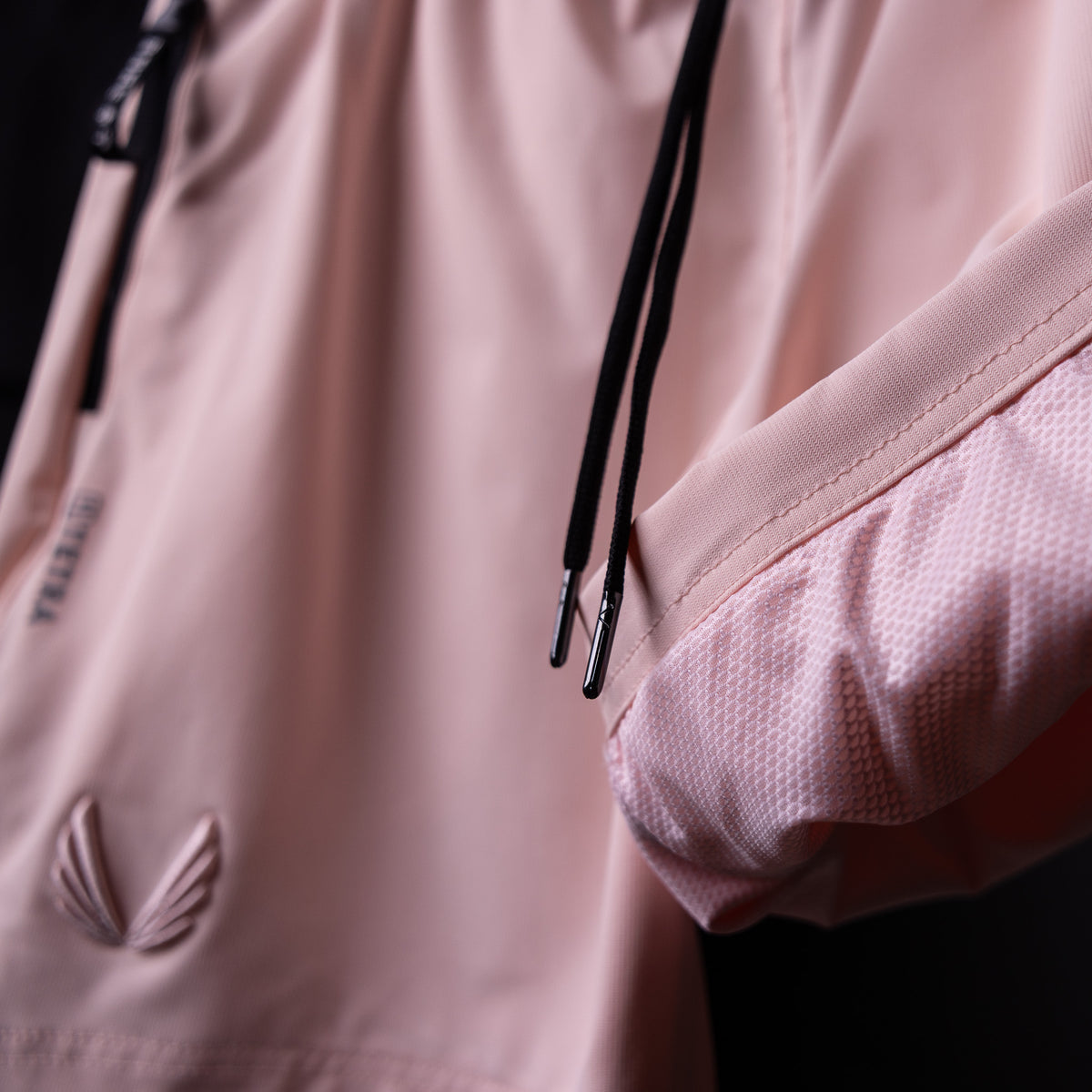 SP'21 Coastal Training Short in pink, detail closeup of fabric texture and drawstring