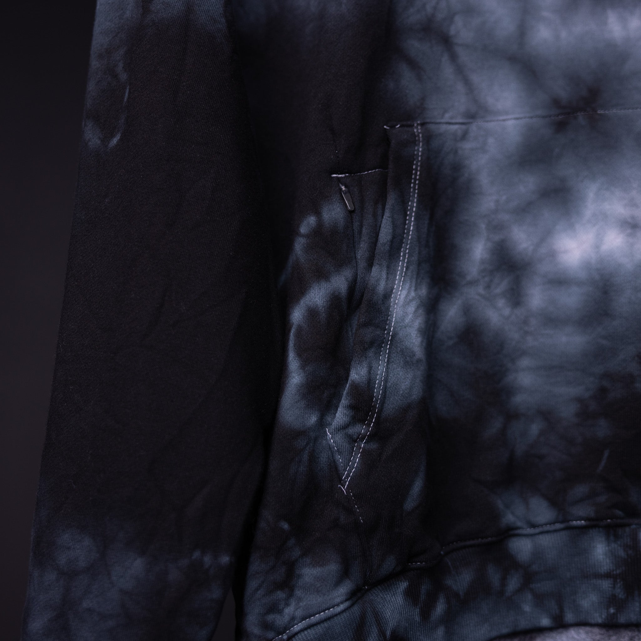 SM'22 Tie Dye Hoodie in navy tie dye, detail closeup of zipper and fabric texture