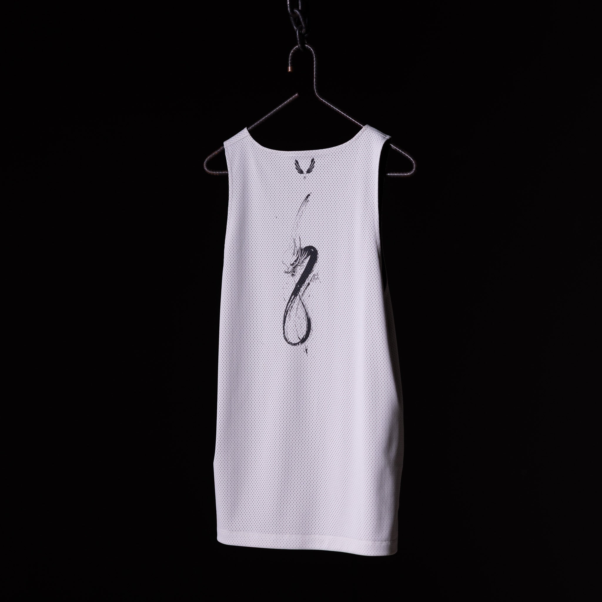 SM'23 Mesh Reversible Pinnie in white, displayed on hanger against black background