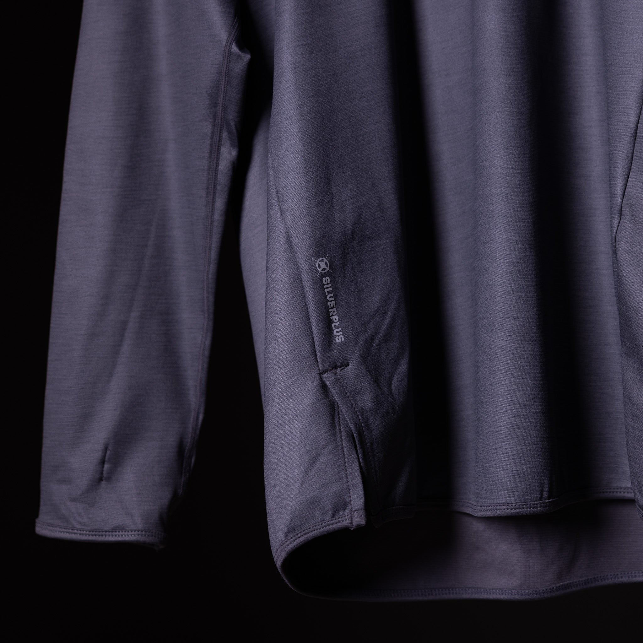 SM'18 Quarter Zip Hoodie in dark blue, detail shot of side seam and fabric texture