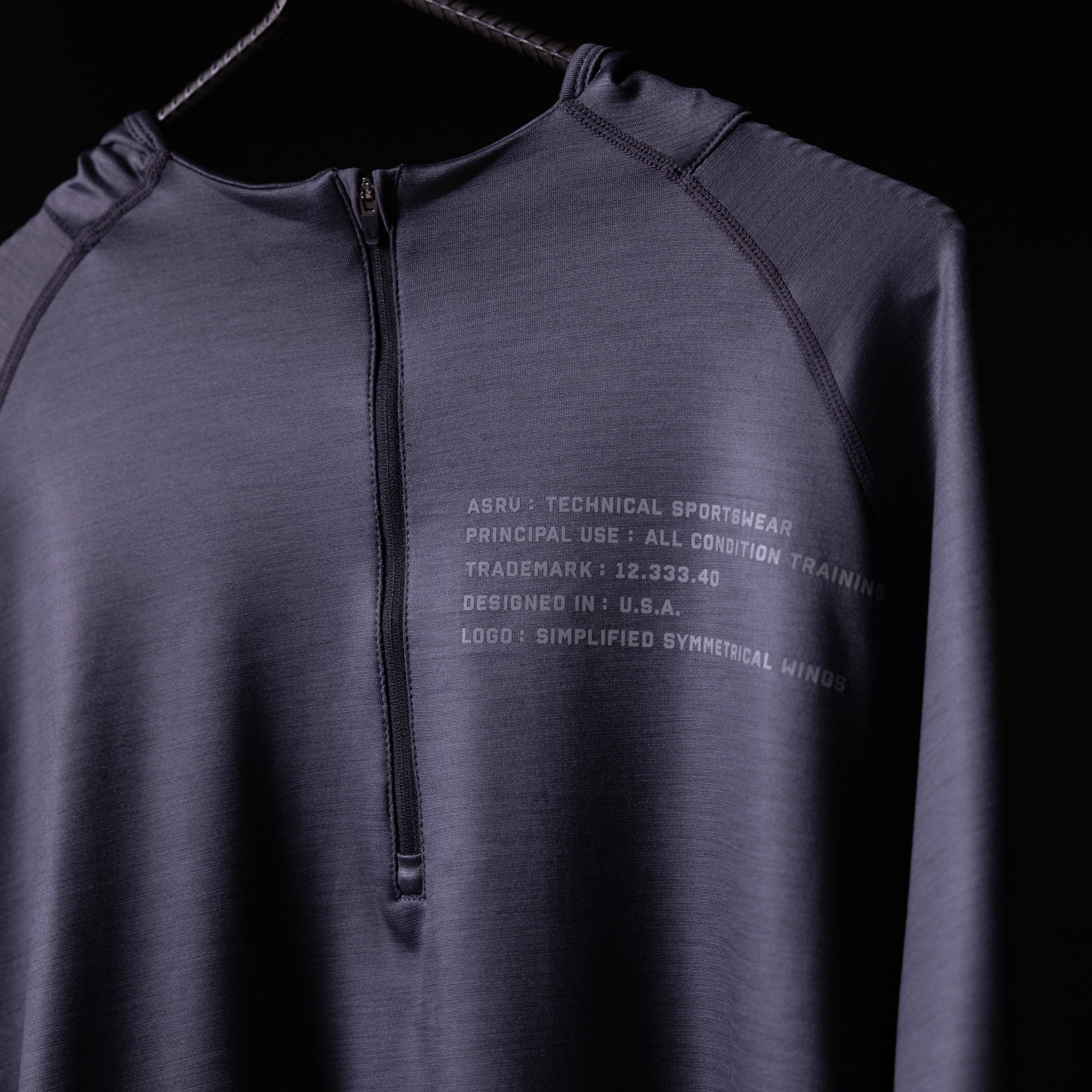 SM'18 Quarter Zip Hoodie in purple, displayed on hanger showing front with text details