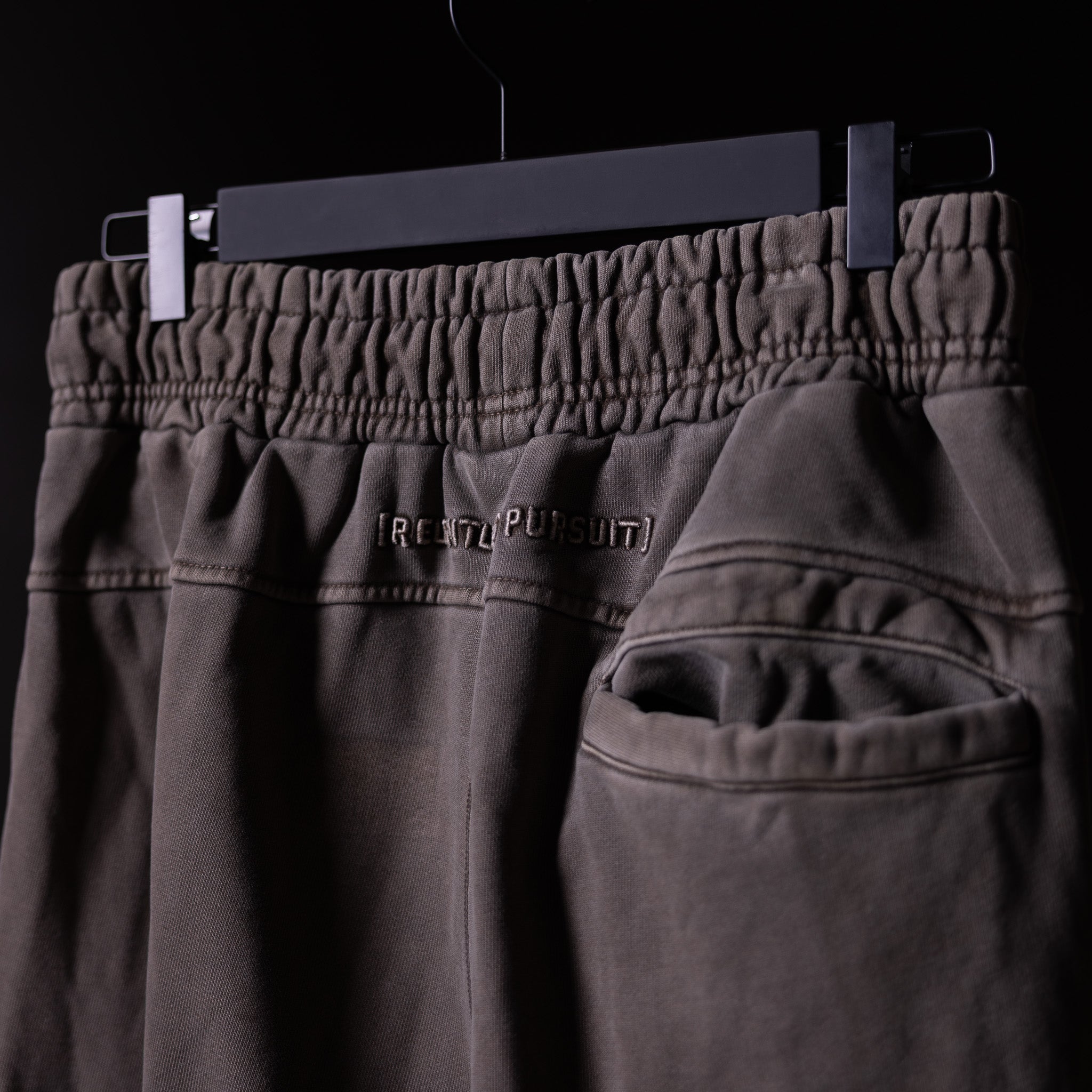 WN'20 Terry Relaxed Jogger in charcoal gray, hanging on hanger detail view