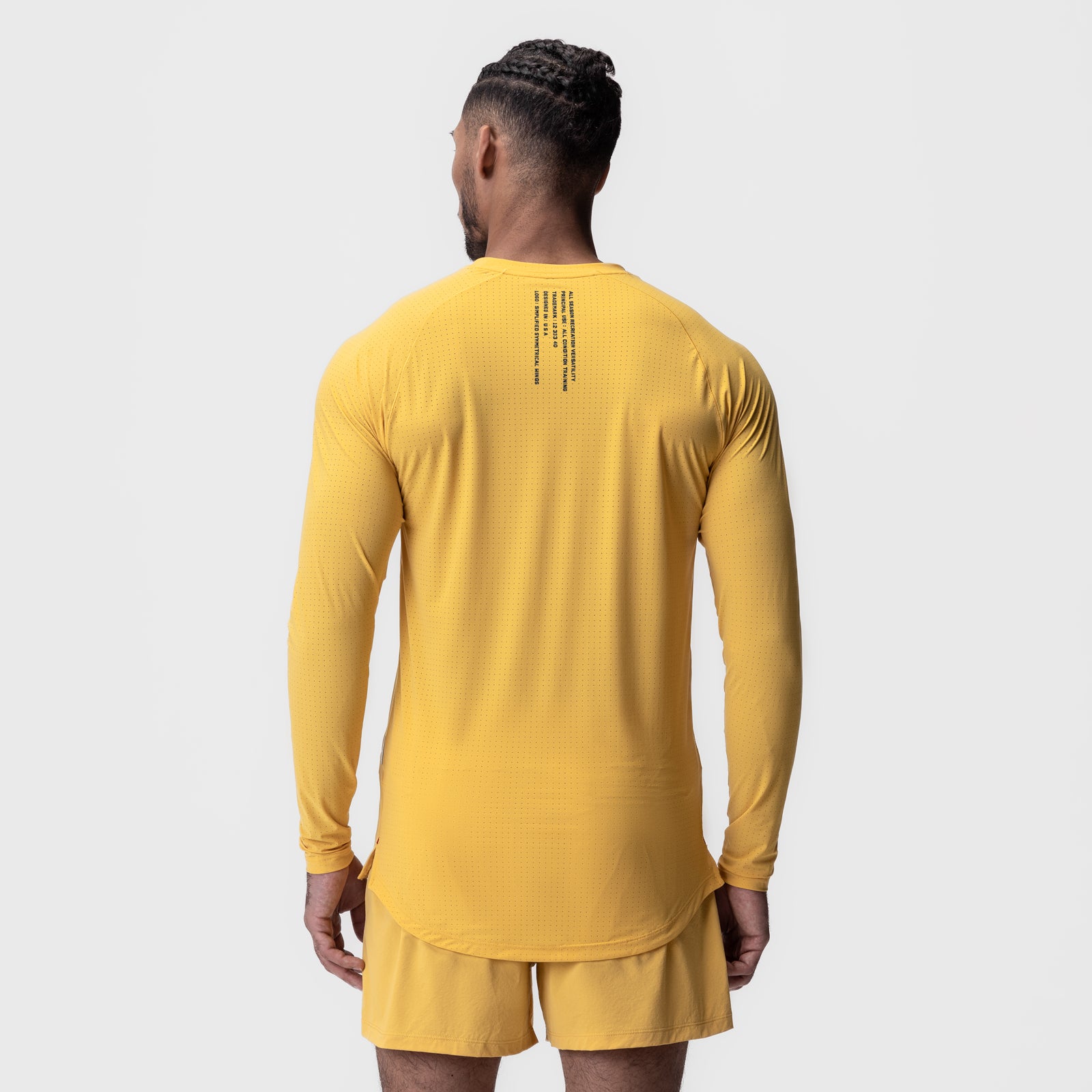 Laser-Vent Established Long Sleeve in amber yellow, back view on model