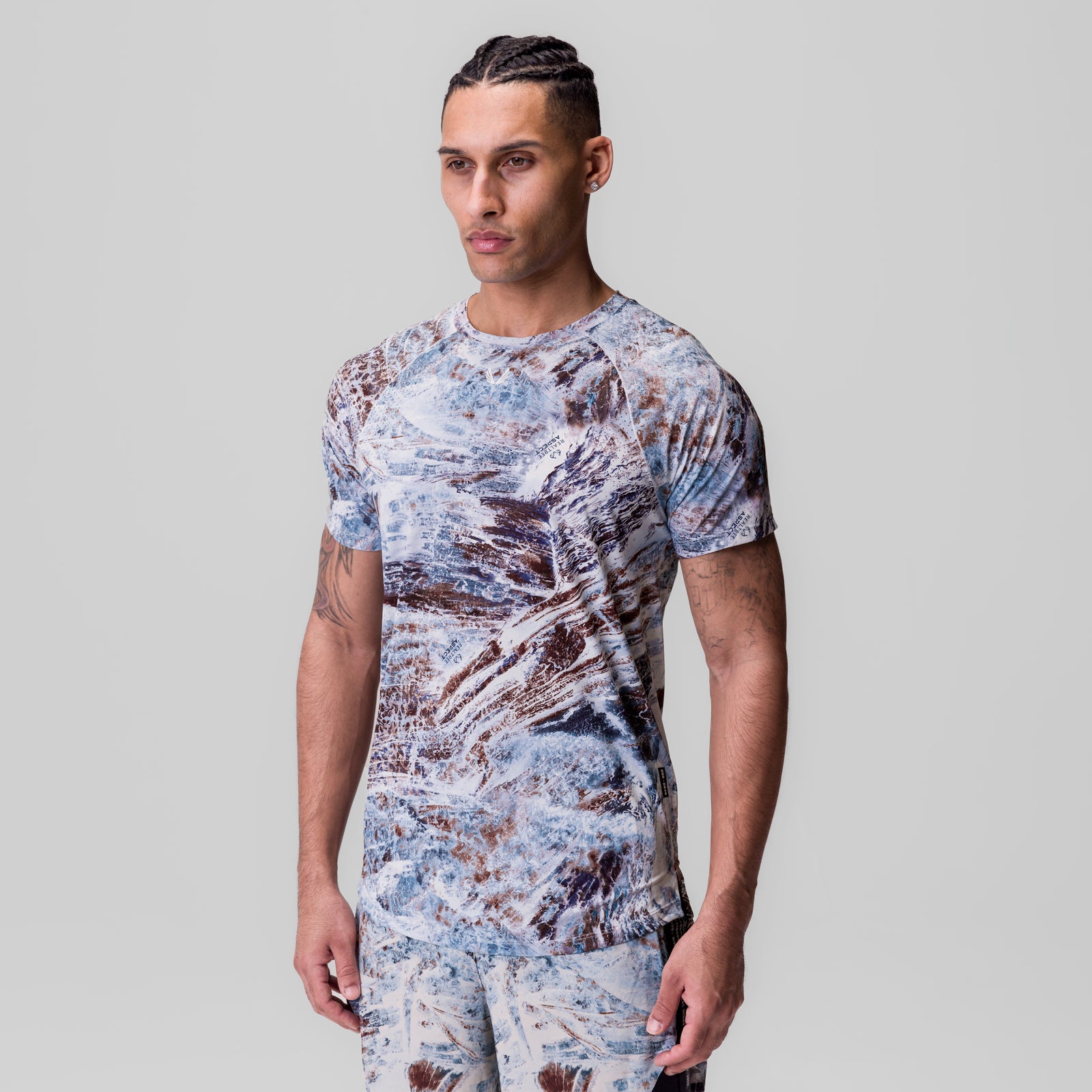 Laser-Vent Established Tee in blue and brown Realtree camo, worn by model facing right