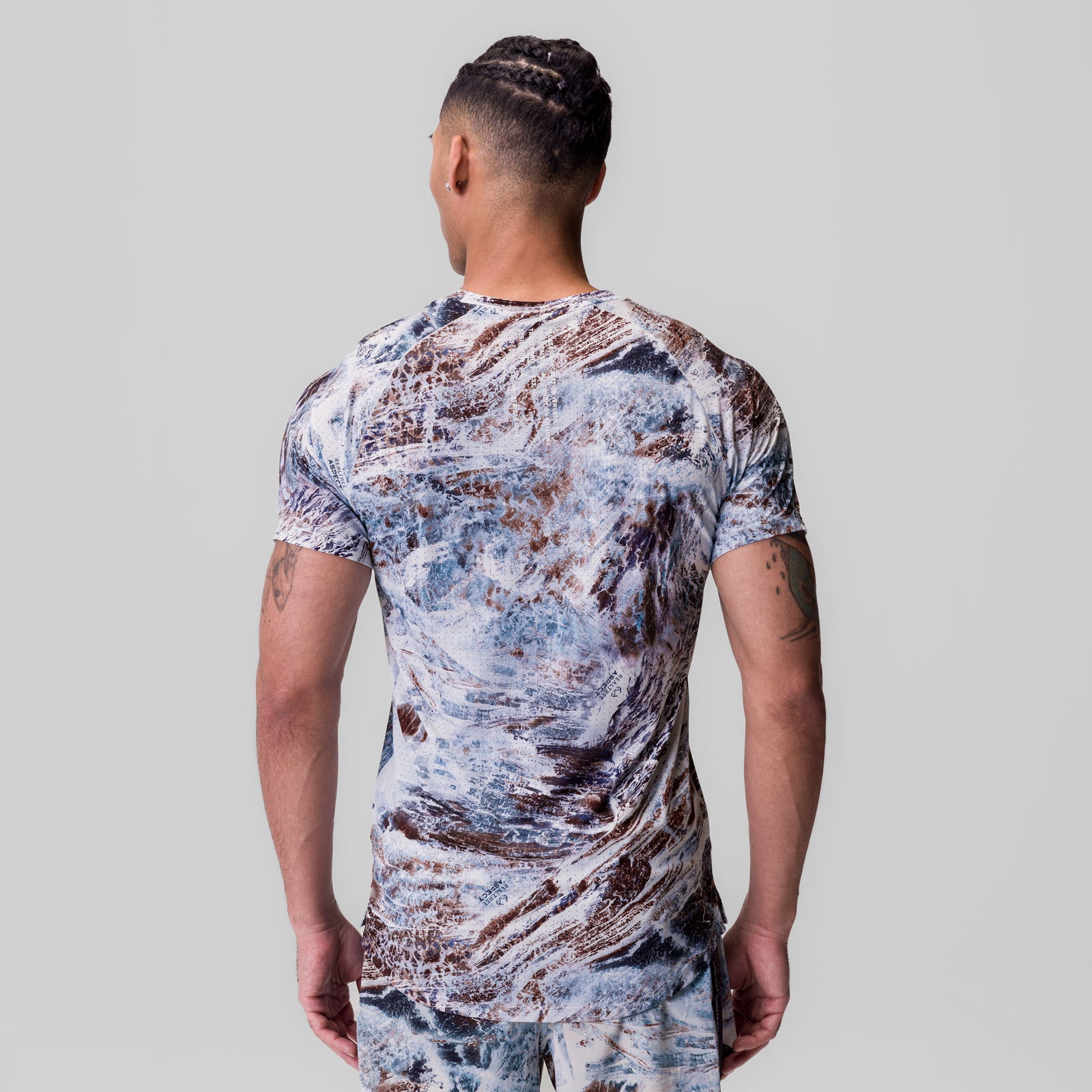 Laser-Vent Established Tee in blue/brown camo print, back view on model