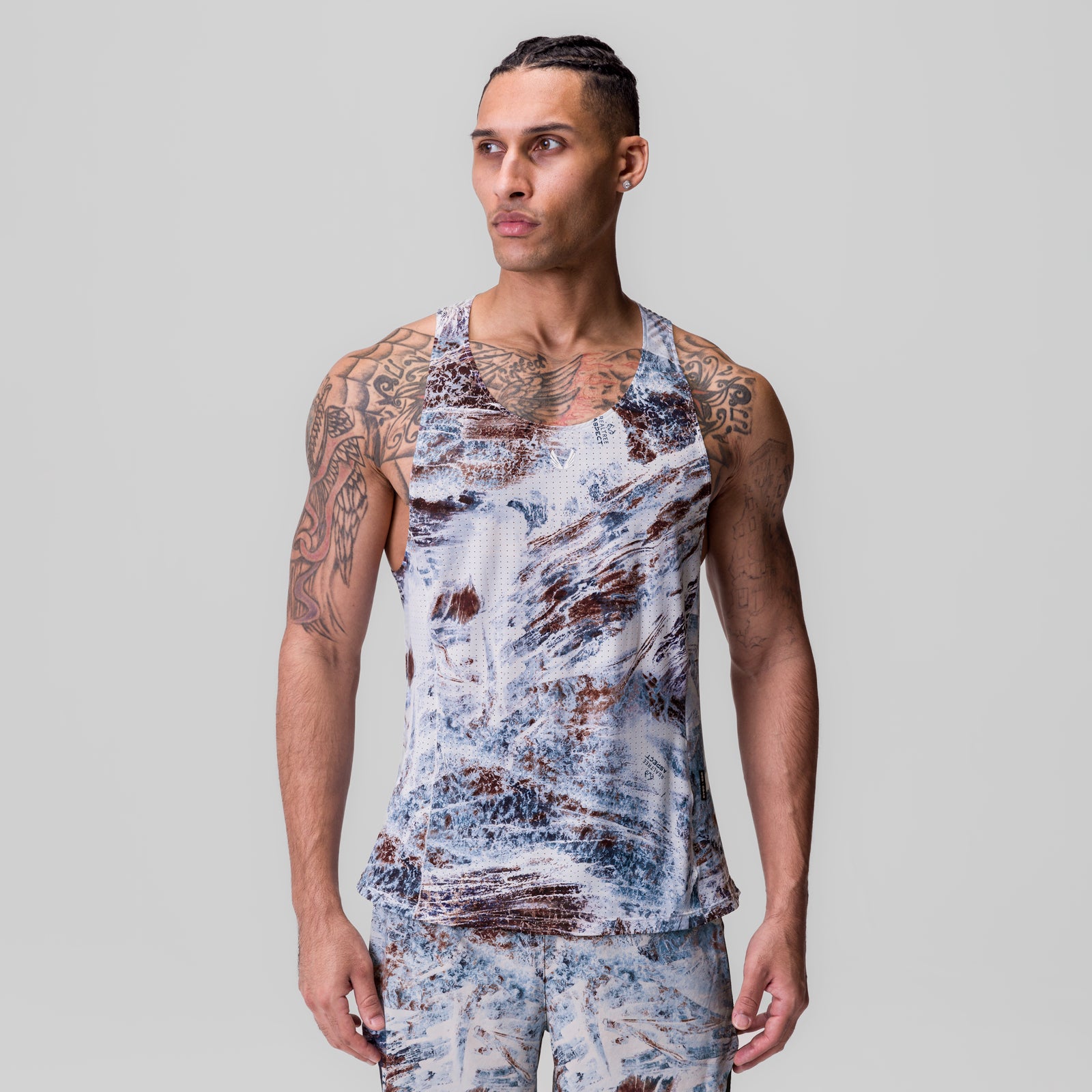 Laser-Vent Singlet Tank in blue/white/brown Realtree Aspect print, worn by model