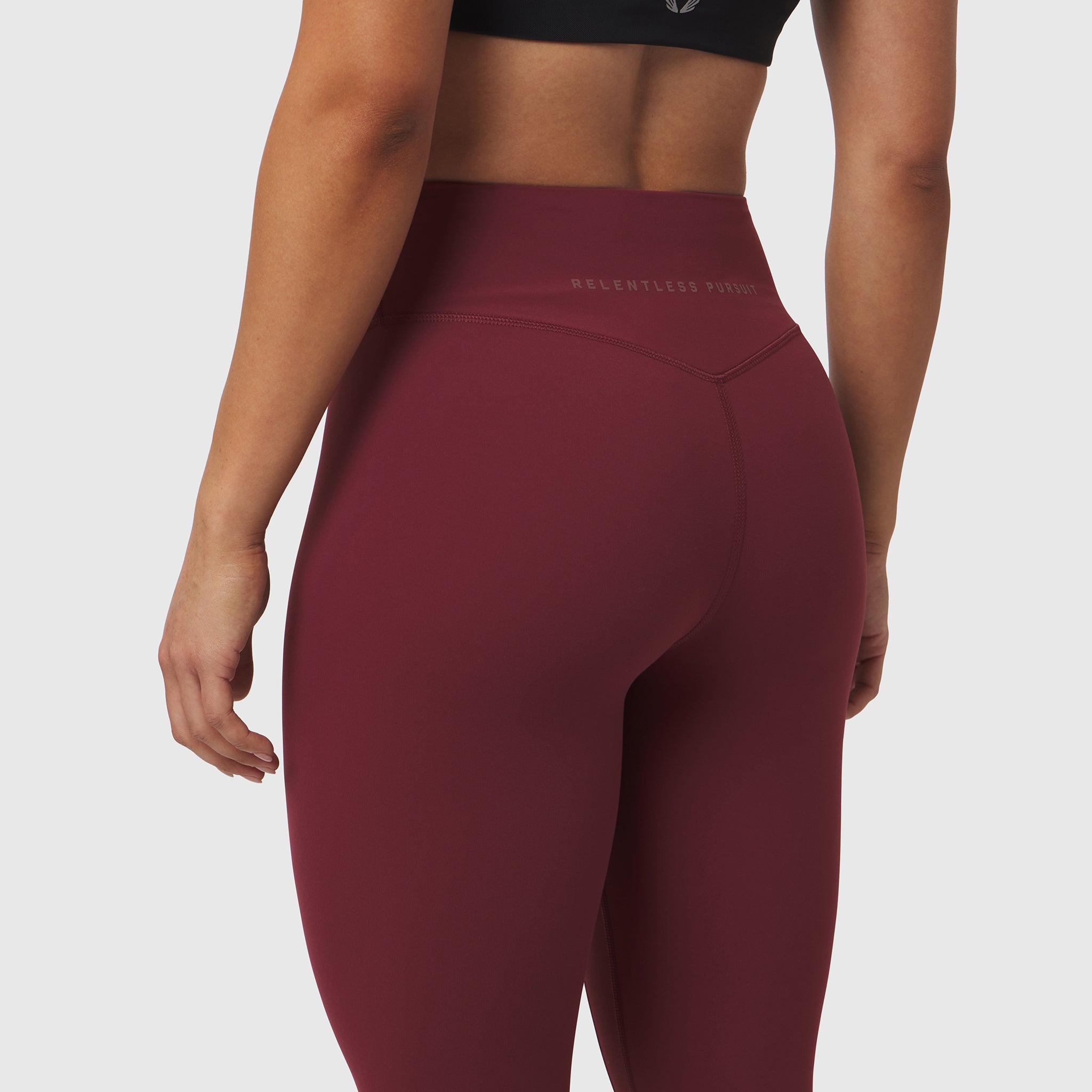 W002 LYCRA® ADAPTIV Legging in Crimson, rear view on model