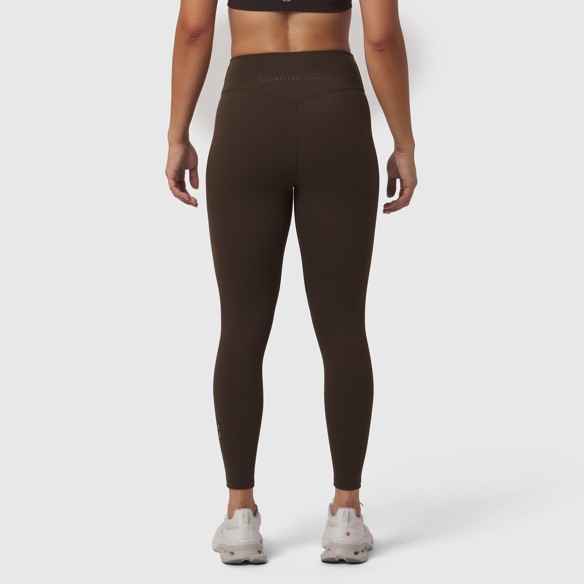 W002 LYCRA® ADAPTIV Legging in Dark Earth, back view on model