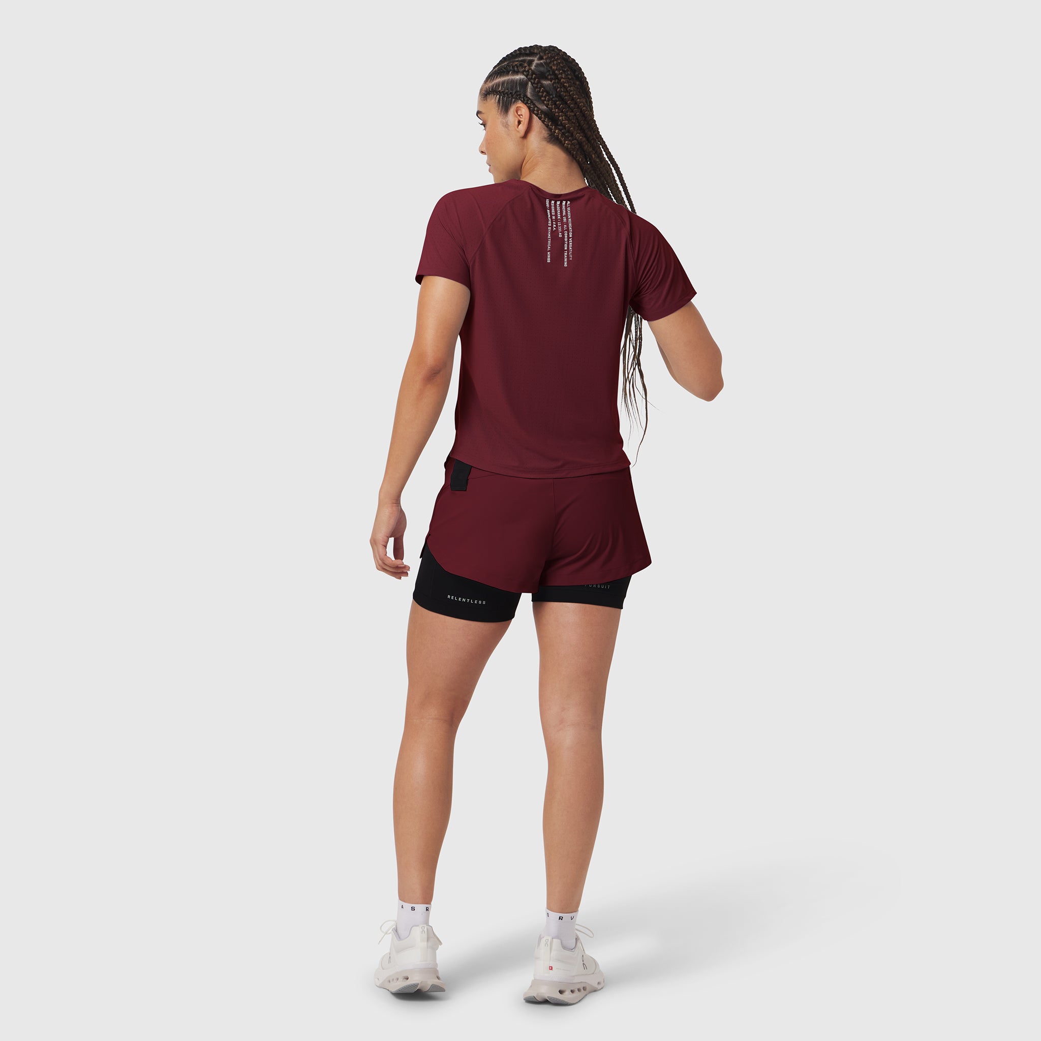 Laser-Vent Established Tee in crimson with matching shorts, back view on model