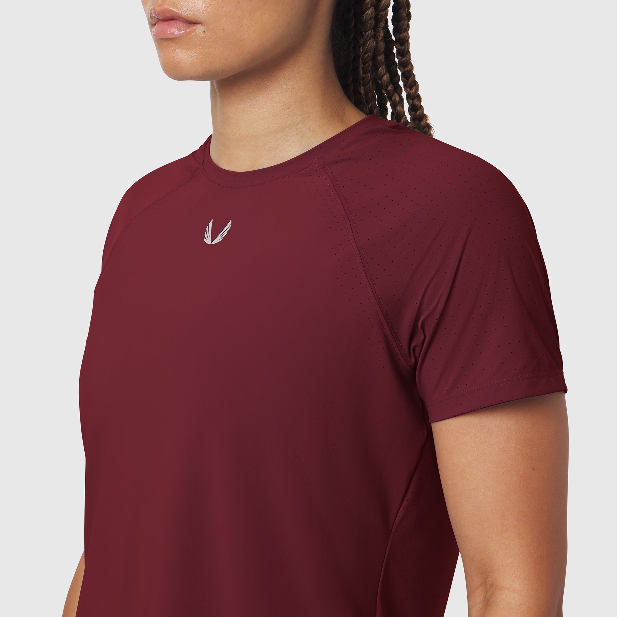 Laser-Vent Established Tee in crimson worn by model, front view