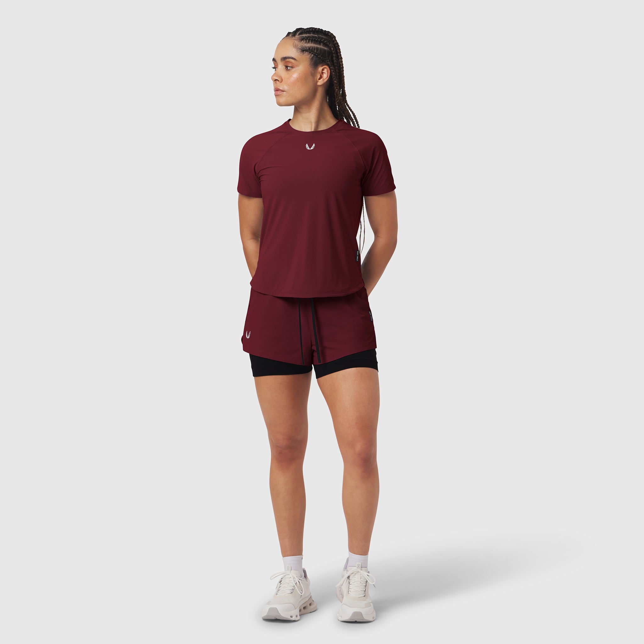 Crimson Laser-Vent Established Tee worn with burgundy shorts, front view on model