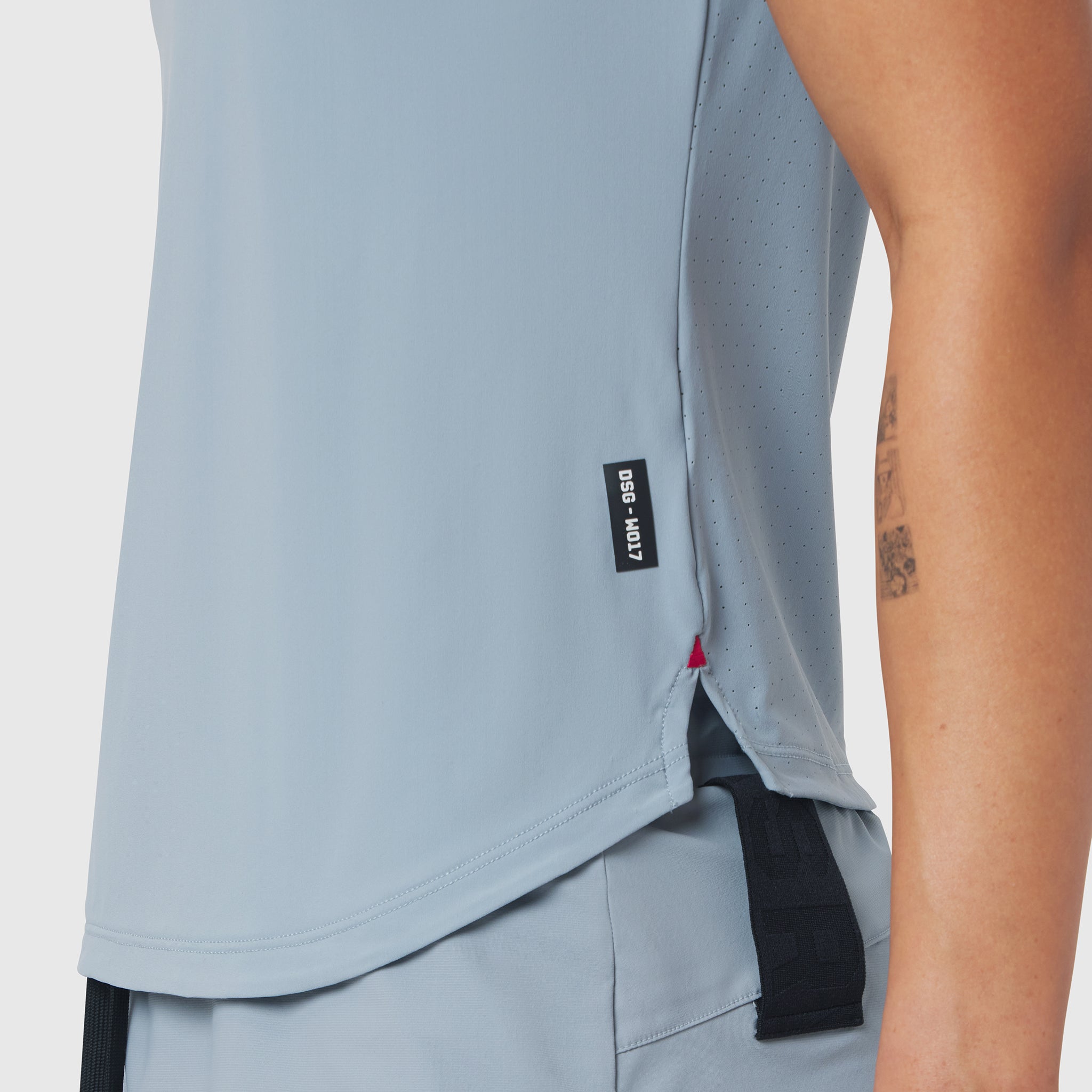 Light Sky Laser-Vent Established Tee on model, side view showing perforated fabric detail