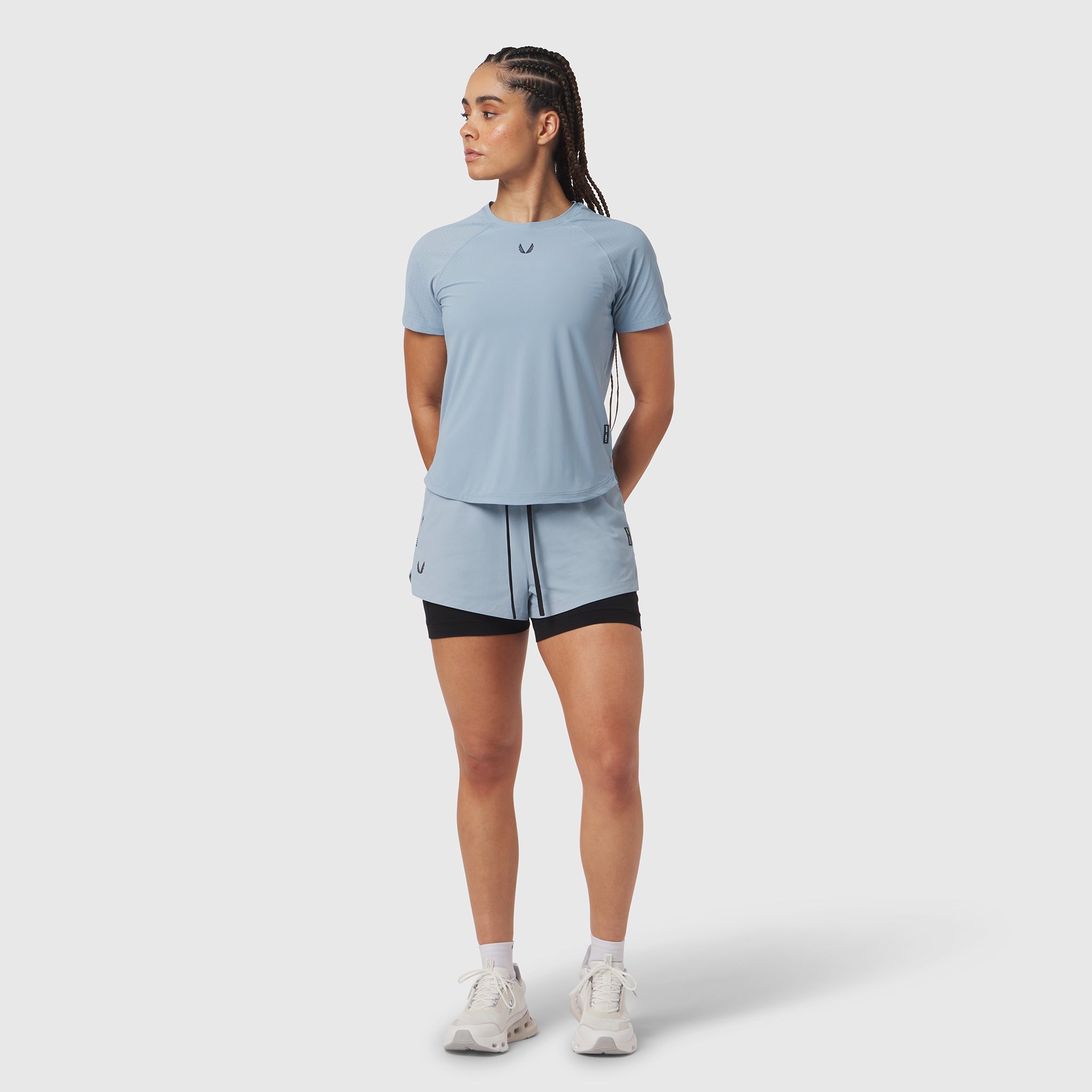 Light sky Laser-Vent Established Tee on model with matching shorts, front view