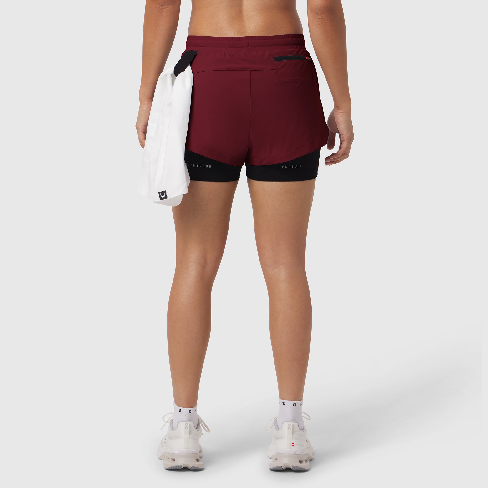 Tetra-Lite® Liner Short in crimson with black inner shorts, worn by model from behind