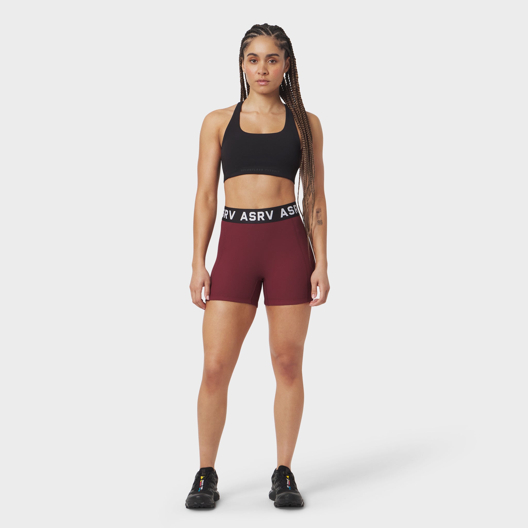 W027 Lycra Ribbed Short in crimson worn by model, front view