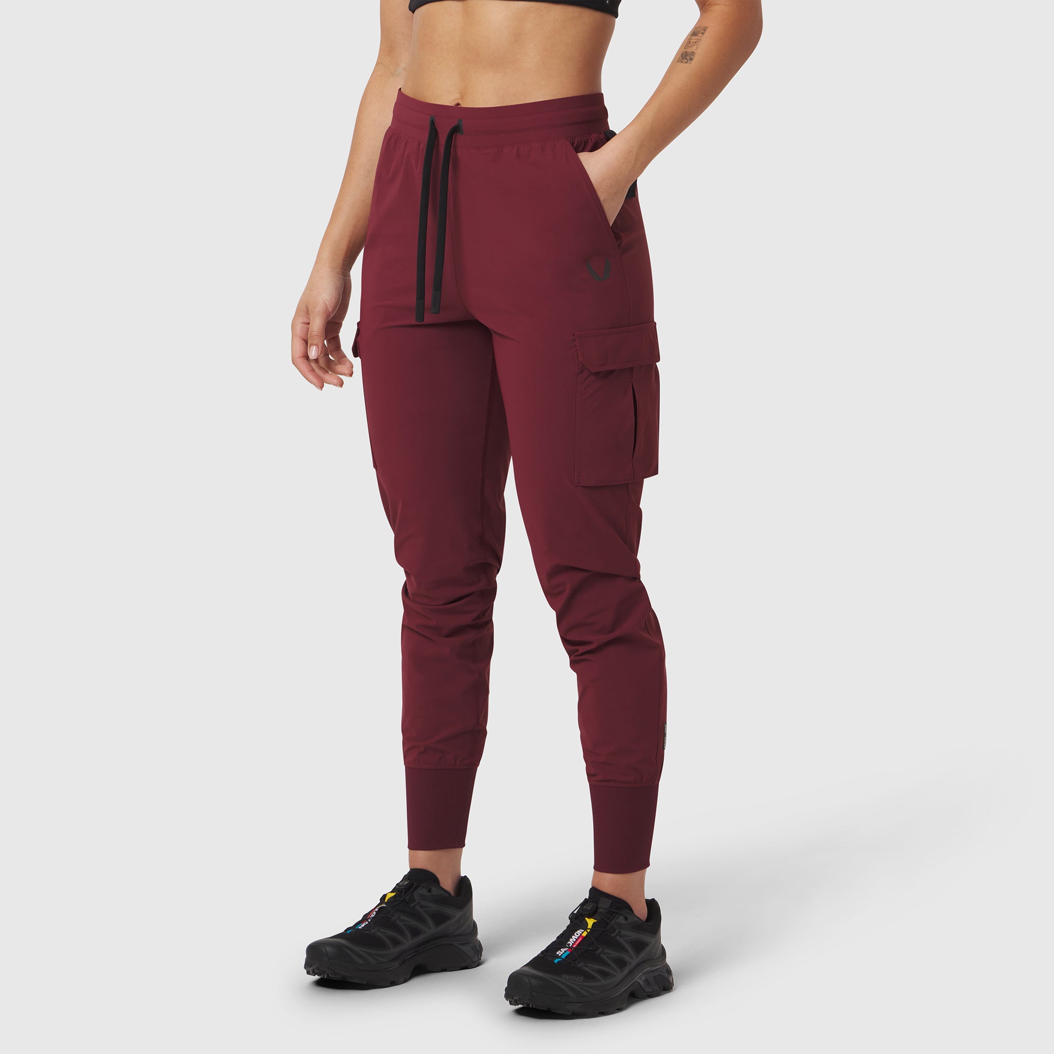 Tetra-Lite Cargo High Rib Jogger in Crimson, worn by model, front view