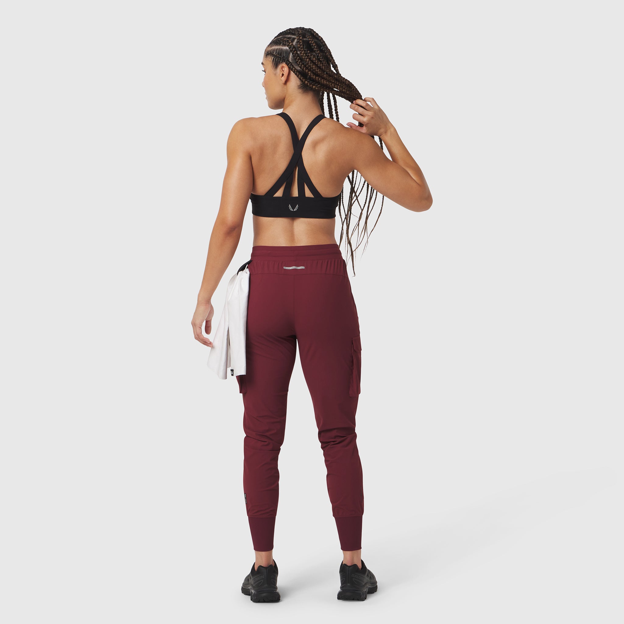 Tetra-Lite Cargo High Rib Jogger in crimson, back view on model