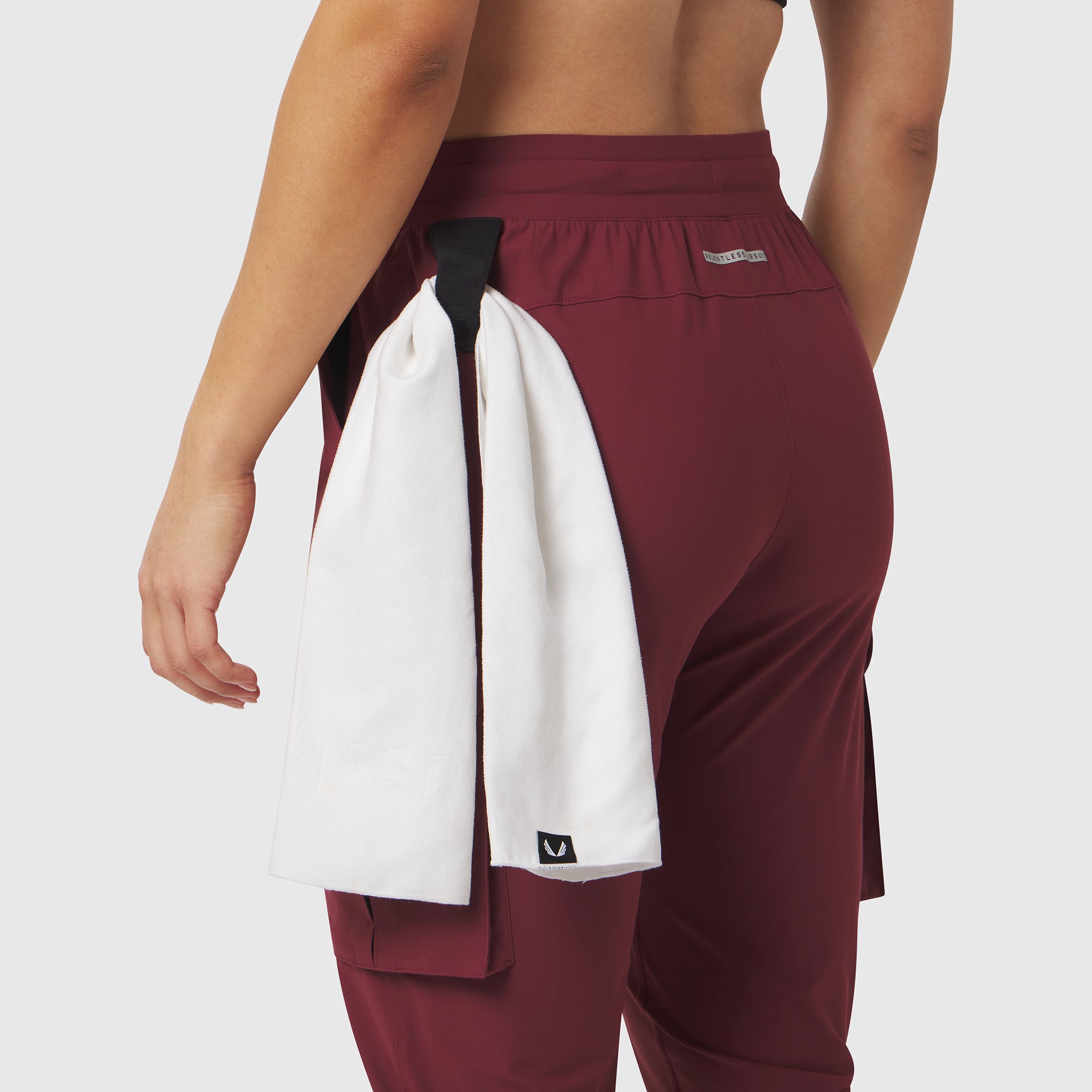 Tetra-Lite Cargo High Rib Jogger in crimson, worn by model from behind with white towel