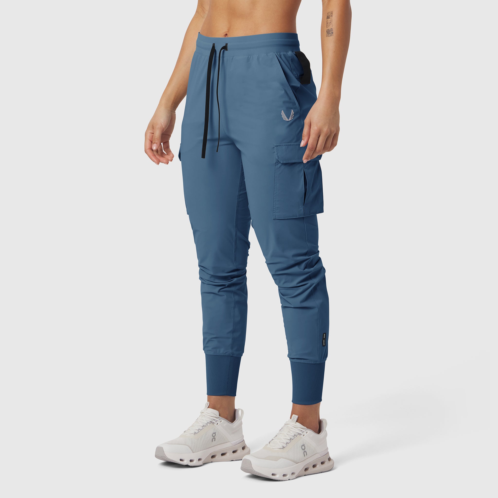 Tetra-Lite Cargo High Rib Jogger in storm blue, worn by model, front view