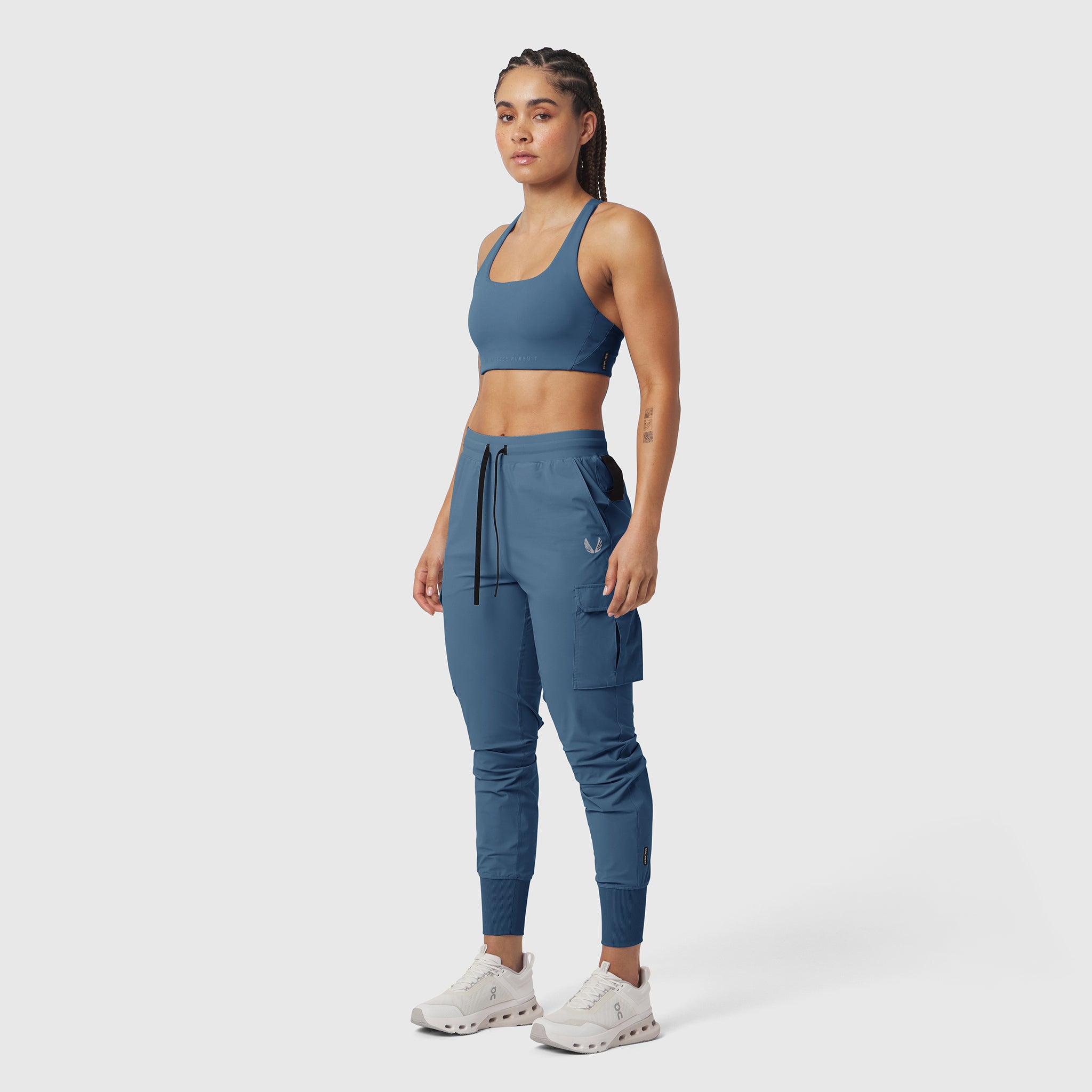 Tetra-Lite Cargo High Rib Jogger in storm blue, worn by model, full-length front view
