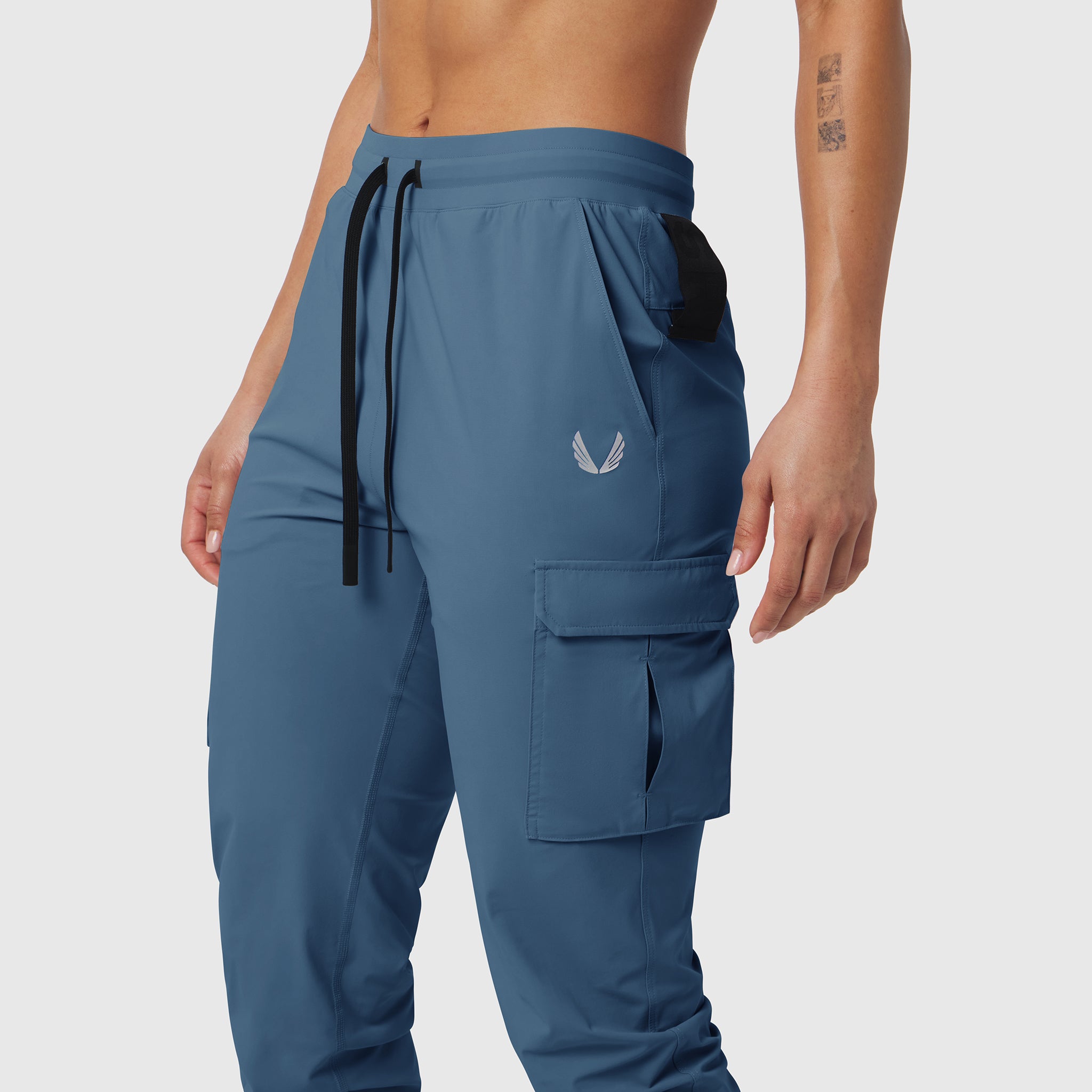 Tetra-Lite® Cargo High Rib Jogger in storm blue, worn by model, side view