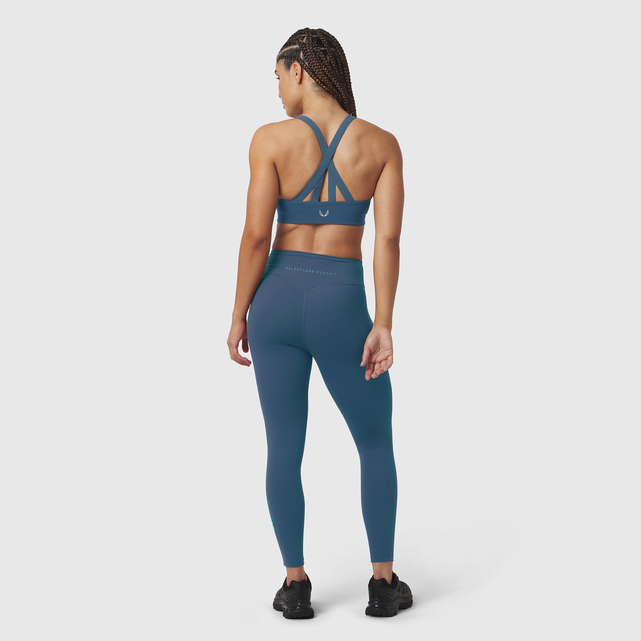 W039 Lycra Hybrid Sports Bra in storm blue, rear view on model