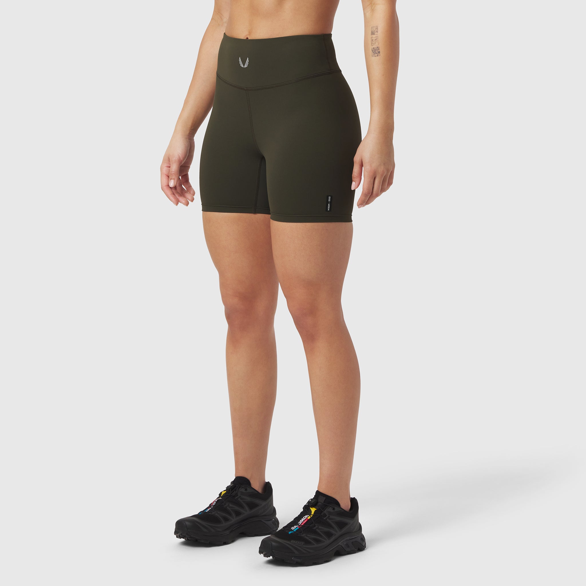 LYCRA® ADAPTIV Biker Short in olive worn by model, front view