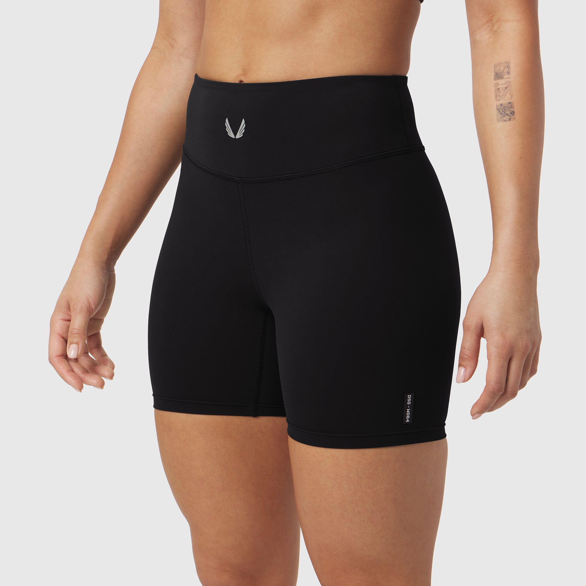 Black LYCRA® ADAPTIV Biker Short worn by model, front view