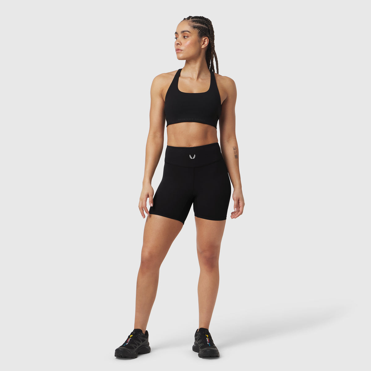 Black LYCRA® ADAPTIV Biker Short worn by model, front view
