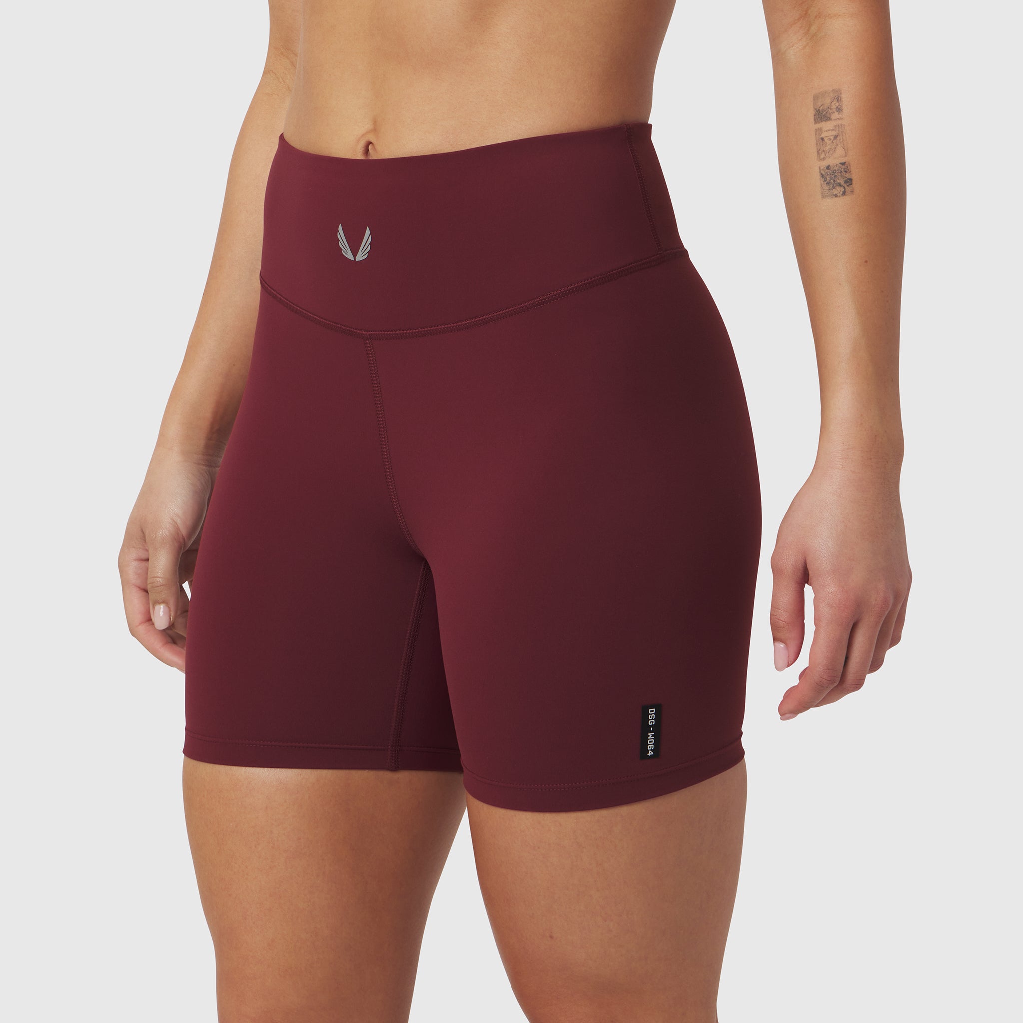 LYCRA® ADAPTIV Biker Short in Crimson worn by model, front view