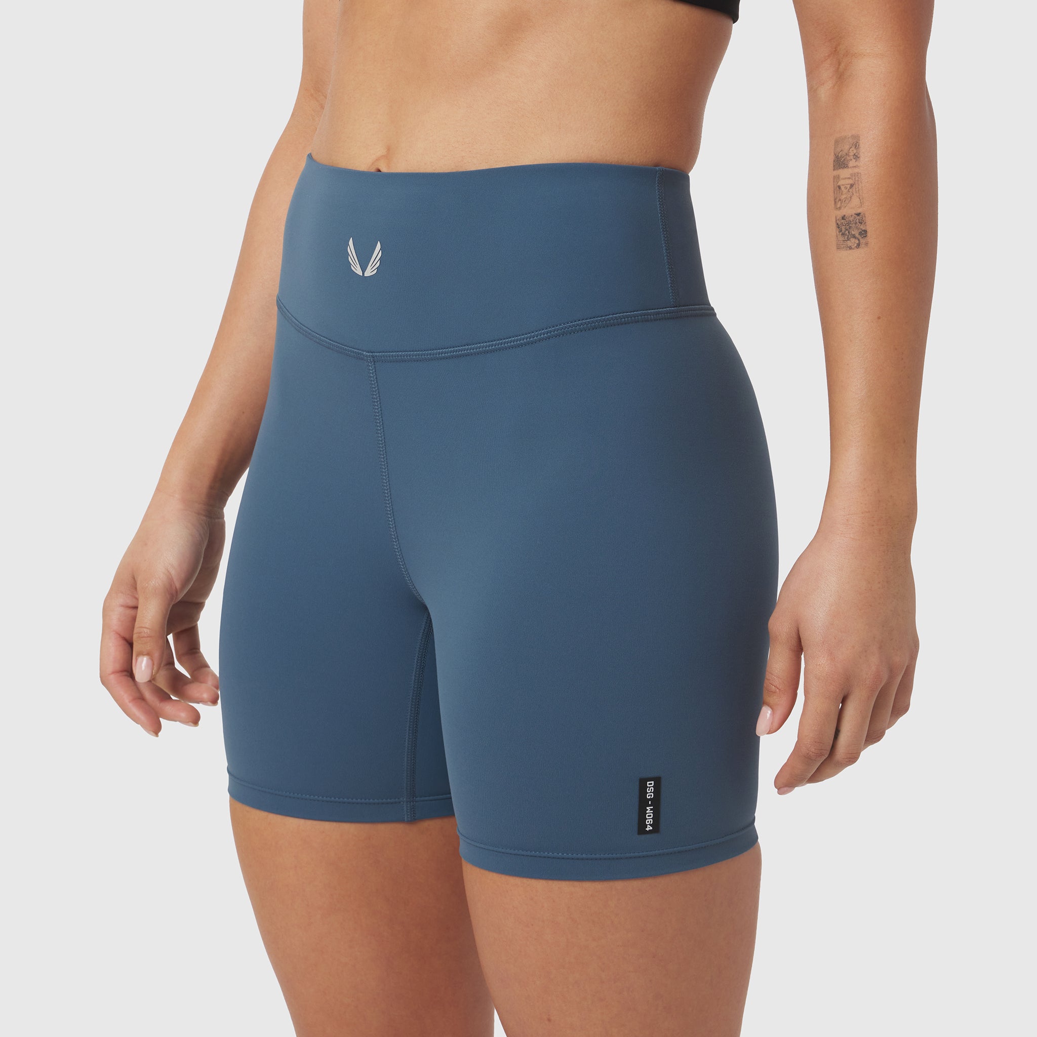 LYCRA® ADAPTIV Biker Short in storm blue, worn by model, front view