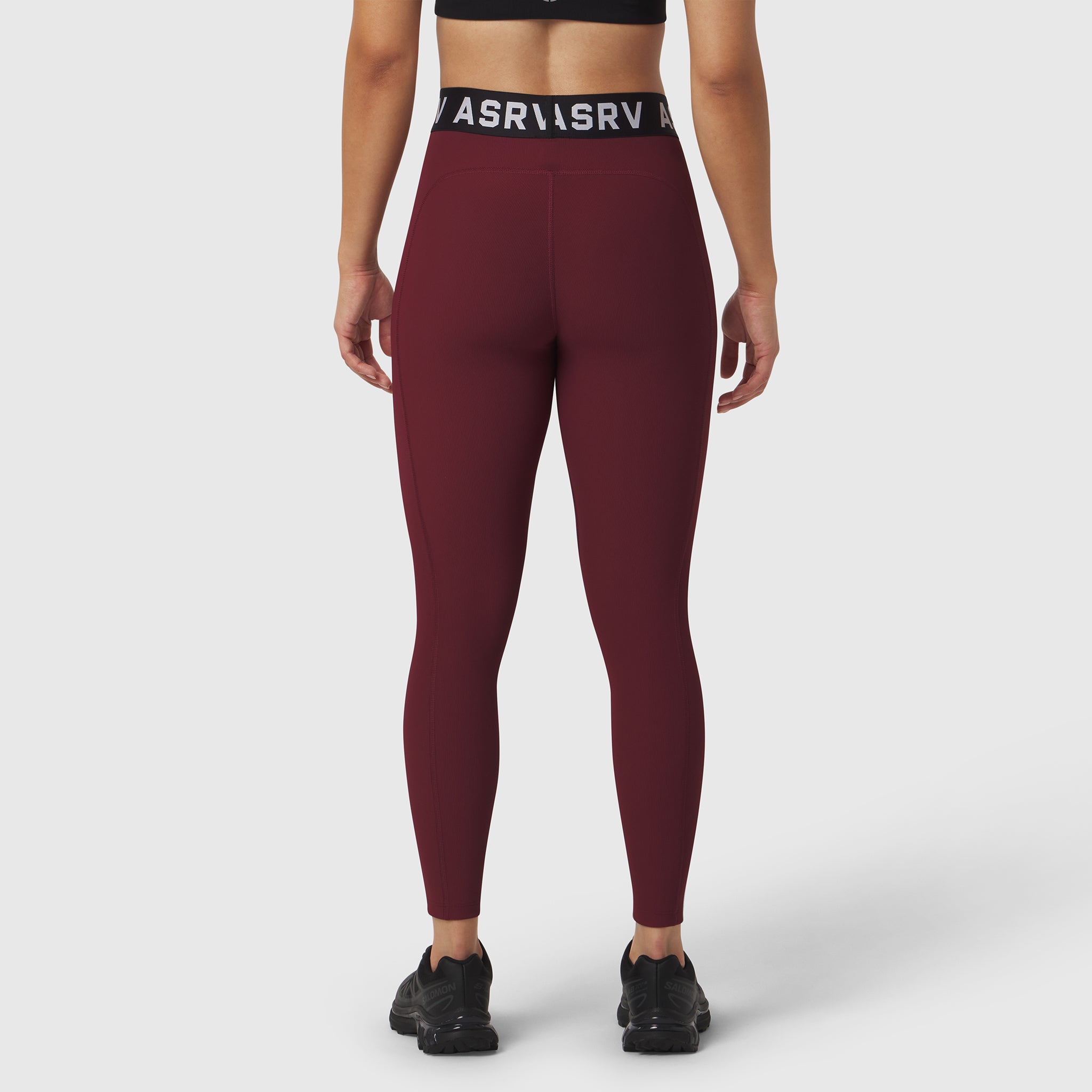 W071 Lycra Ribbed Legging in crimson, worn by model from waist down, back view