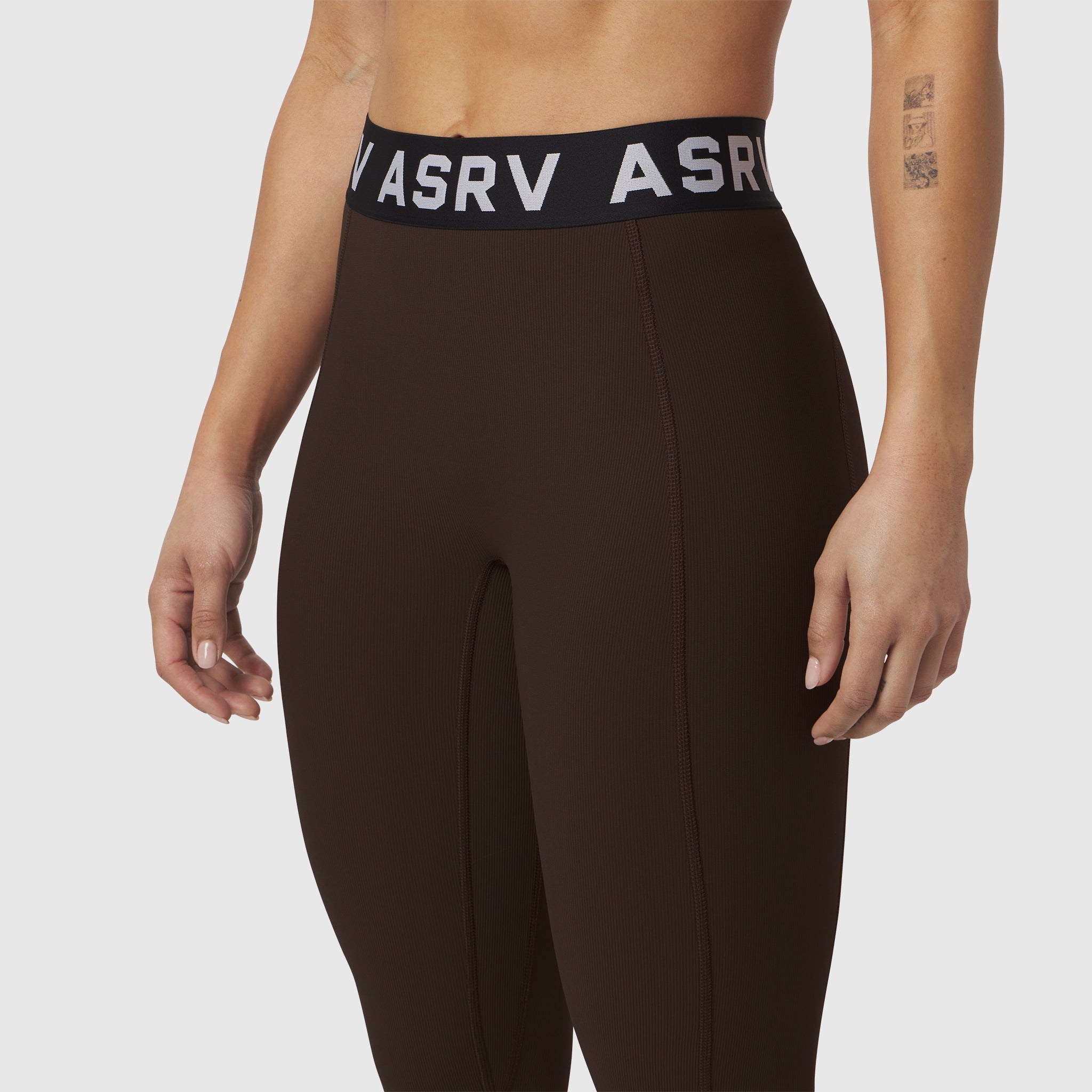 W071 Lycra Ribbed Legging in dark earth, worn by model showing waistband detail and fit
