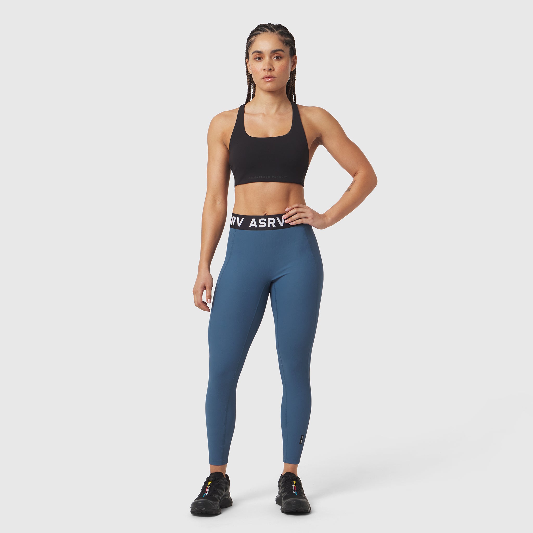 W071 Lycra Ribbed Legging in storm blue, worn by model standing facing camera