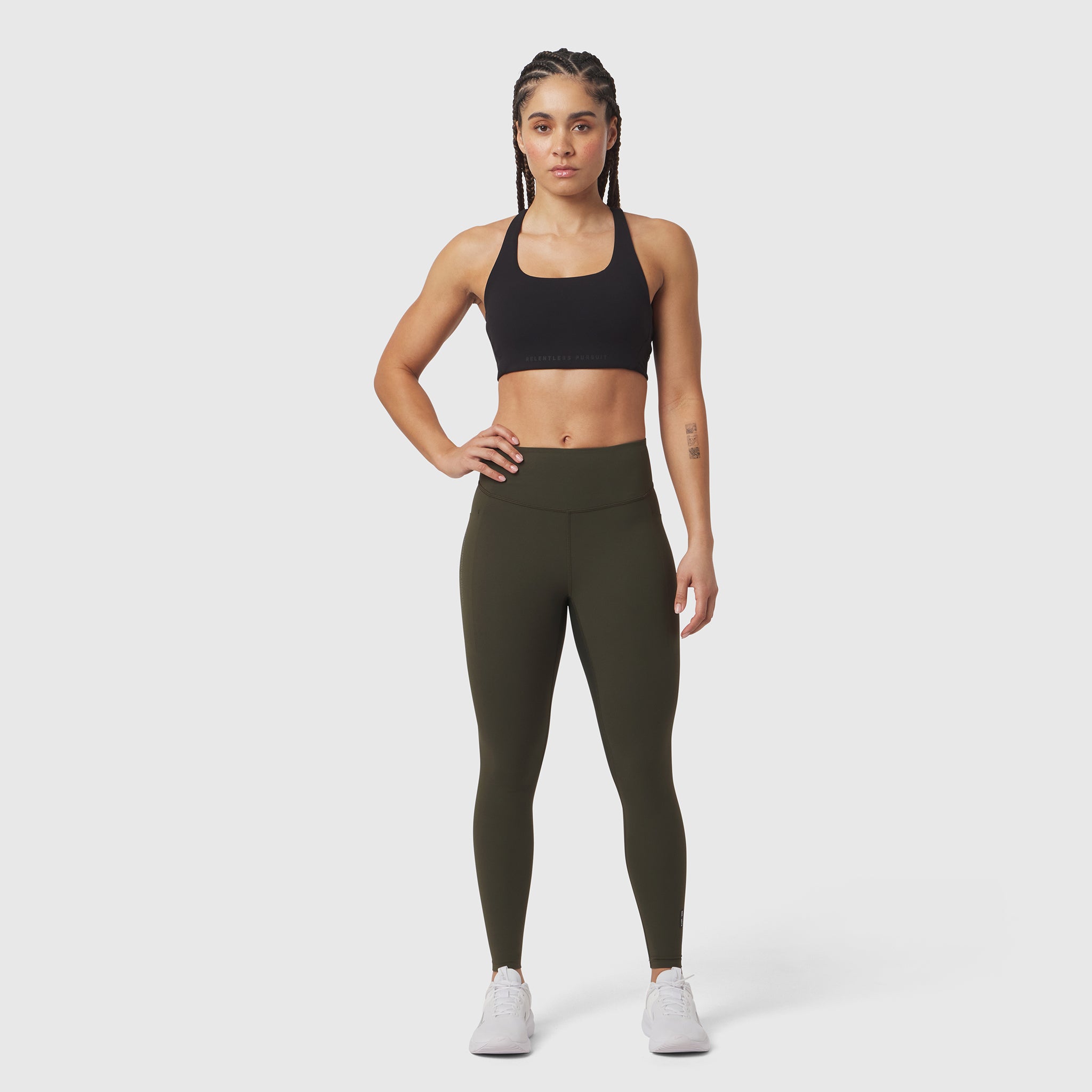 W072 LYCRA® ADAPTIV 4 Pocket Legging in olive, worn with sports bra, front view