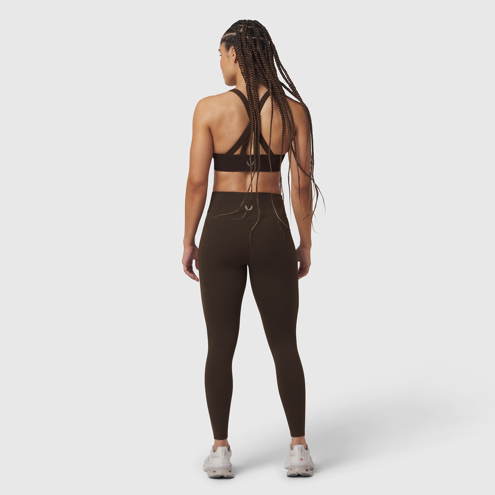 W072 LYCRA® ADAPTIV 4 Pocket Legging in Dark Earth, back view on model